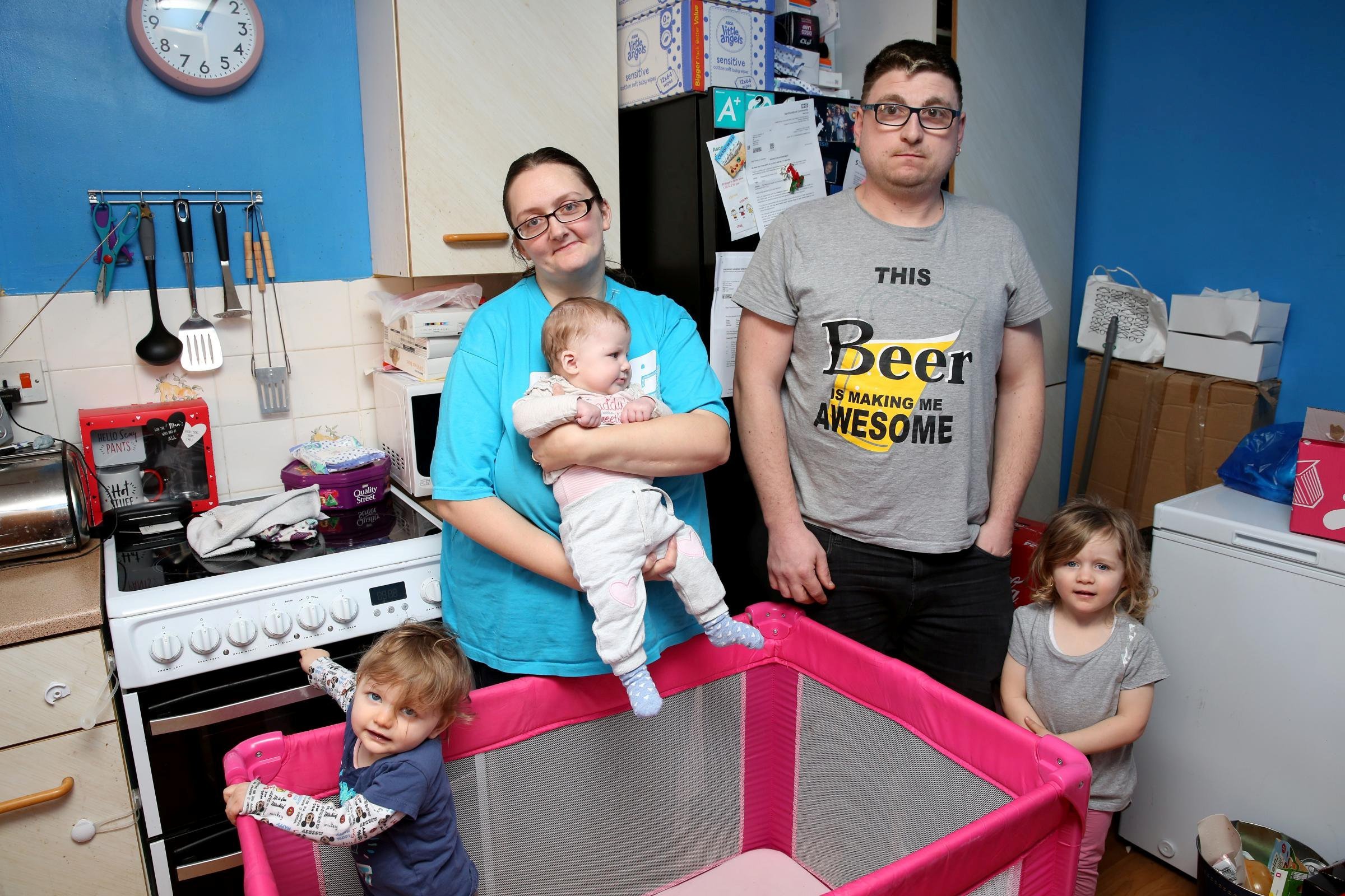Michelle & Martin Toms, with Lexi, 3, Kacie (19 months) & Tori (6 months). See National News story NNcramped. The infant children of two vulnerable parents have been forced to sleep in their kitchen and front room because their living conditions have become too cramped. Michelle and Martin Toms, 37 and 34, said neither of their three children is able to get a proper nights? sleep while they all have to share a one-bedroom bungalow in Chapel Way, Bedmond ? and that their eldest daughter Lexi ?suffers? so much she sometimes misses nursery. The couple, who battle with disabilities and learning difficulties, said they have been bidding with Three Rivers District Council for a larger property since they moved in in 2015.