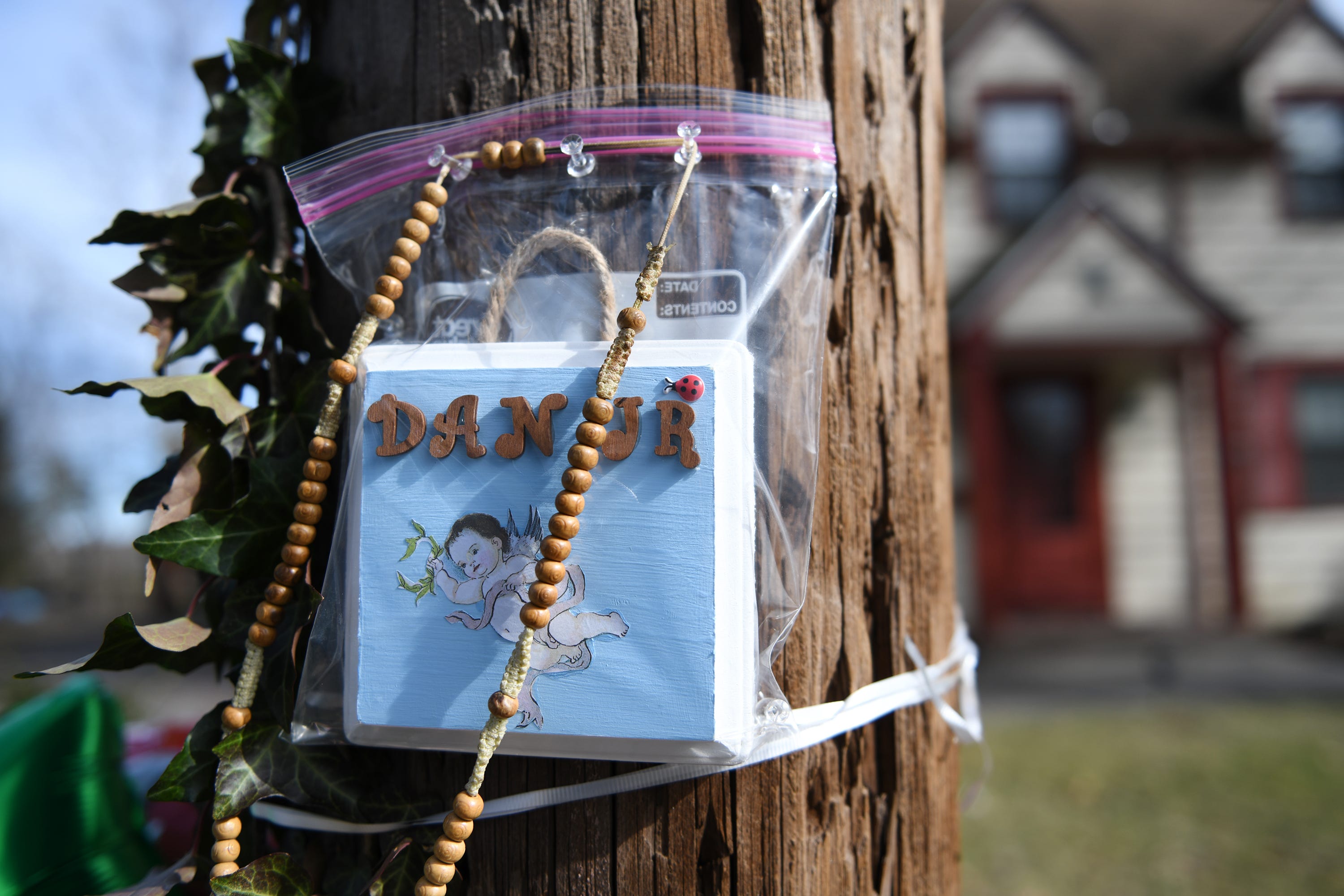 A roadside memorial was on display outside the Bridgeton home of 2-year-old Daniel Griner Jr. on Thursday, Feb. 14, 2019. Authorities say his burned and dismembered remains were found in a purse and trash bags underneath a shed at the family's home on Woodland Drive.