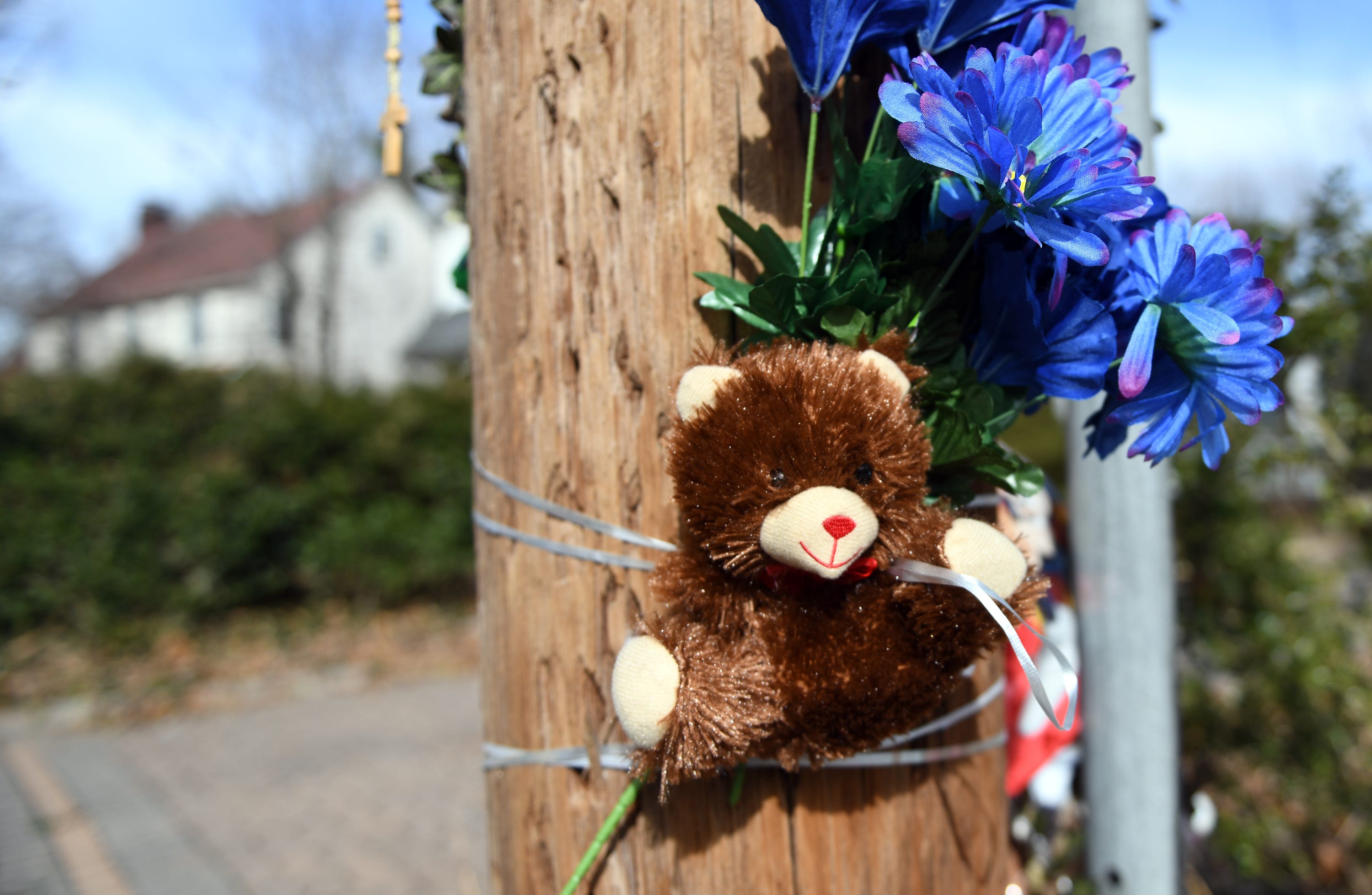 A roadside memorial was on display outside the Bridgeton home of 2-year-old Daniel Griner Jr. on Thursday, Feb. 14, 2019. Authorities say his burned and dismembered remains were found in a purse and trash bags underneath a shed at the family's home on Woodland Drive.
