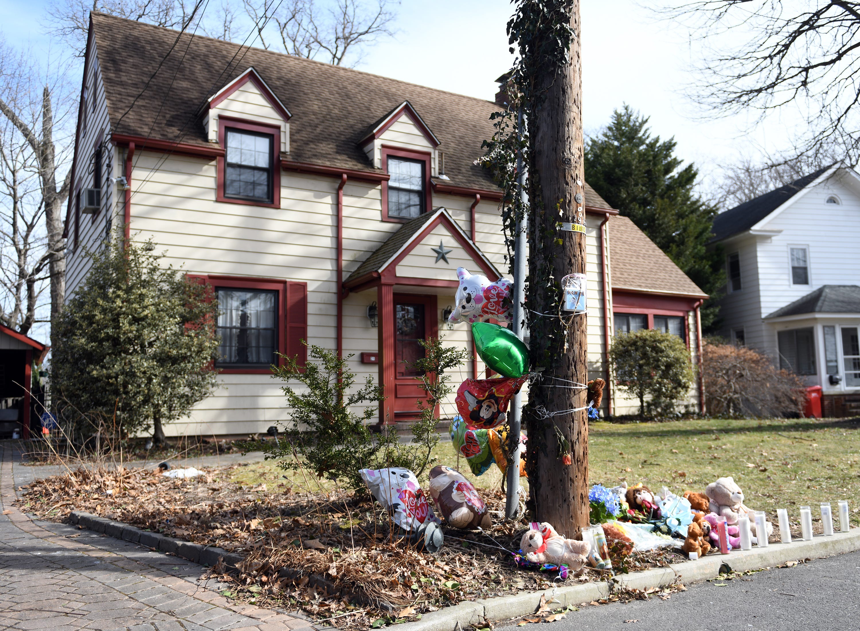 A roadside memorial was on display outside the Bridgeton home of 2-year-old Daniel Griner Jr. on Thursday, Feb. 14, 2019. Authorities say his burned and dismembered remains were found in a purse and trash bags underneath a shed at the family's home on Woodland Drive.