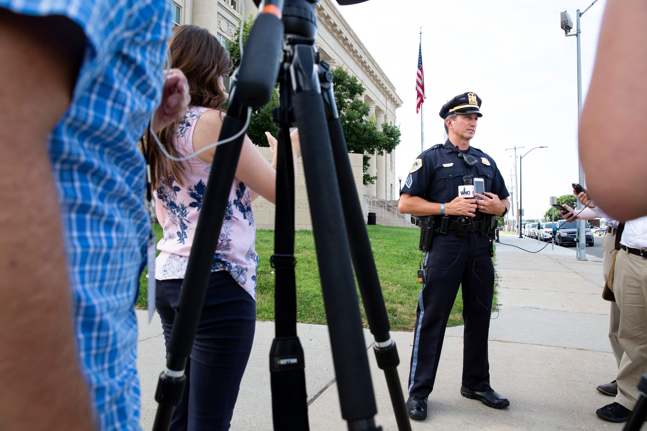 Des Moines Police Sgt. Paul Parizek addresses members of the press after Police were called to a home where three people were found dead on Wednesday, July 17, 2019, in Des Moines.