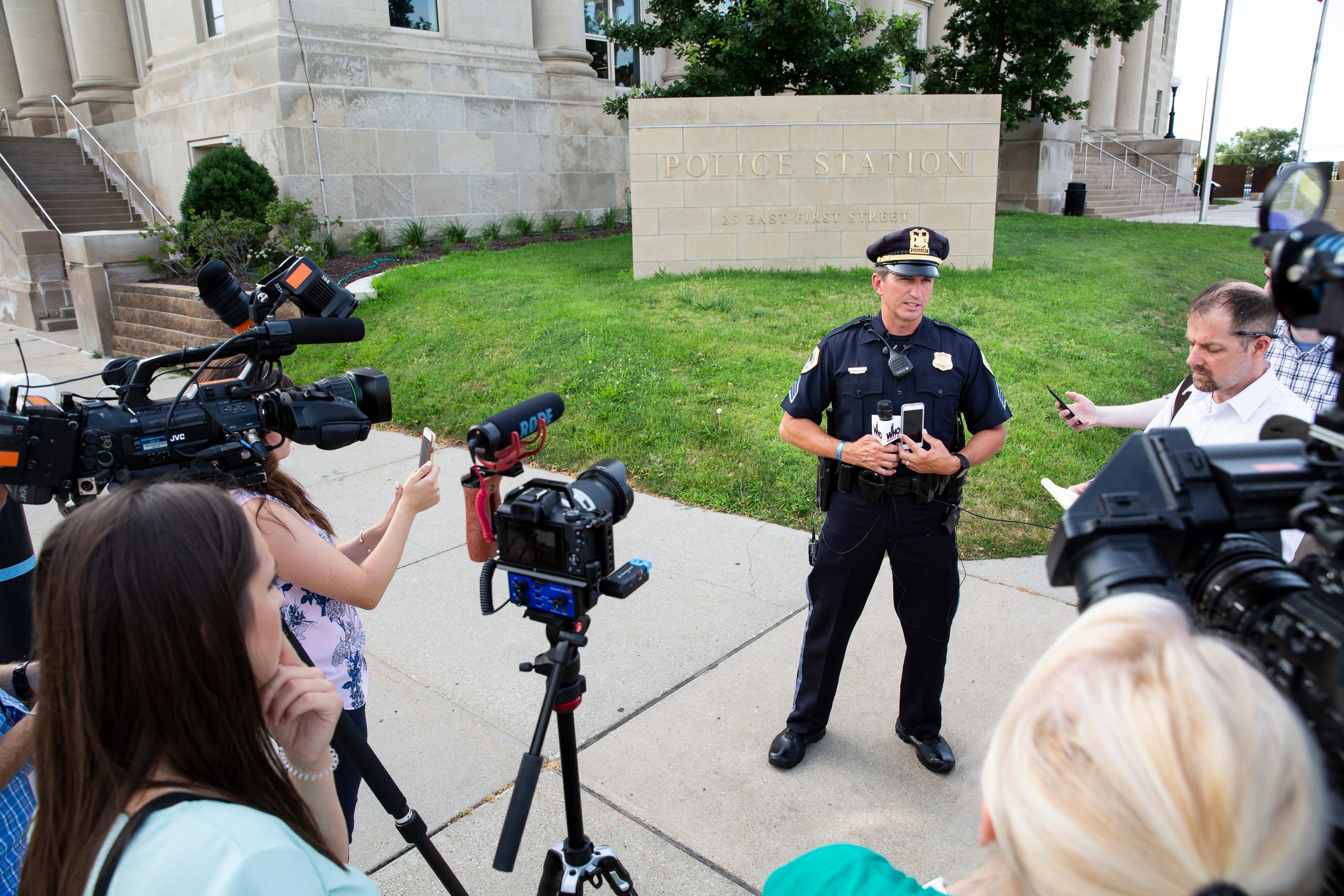 Des Moines Police Sgt. Paul Parizek addresses members of the press after Police were called to a home where three people were found dead on Wednesday, July 17, 2019, in Des Moines.