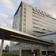 How did Cooper Hospital's attempt to buy Lourdes Medical Center fall apart?