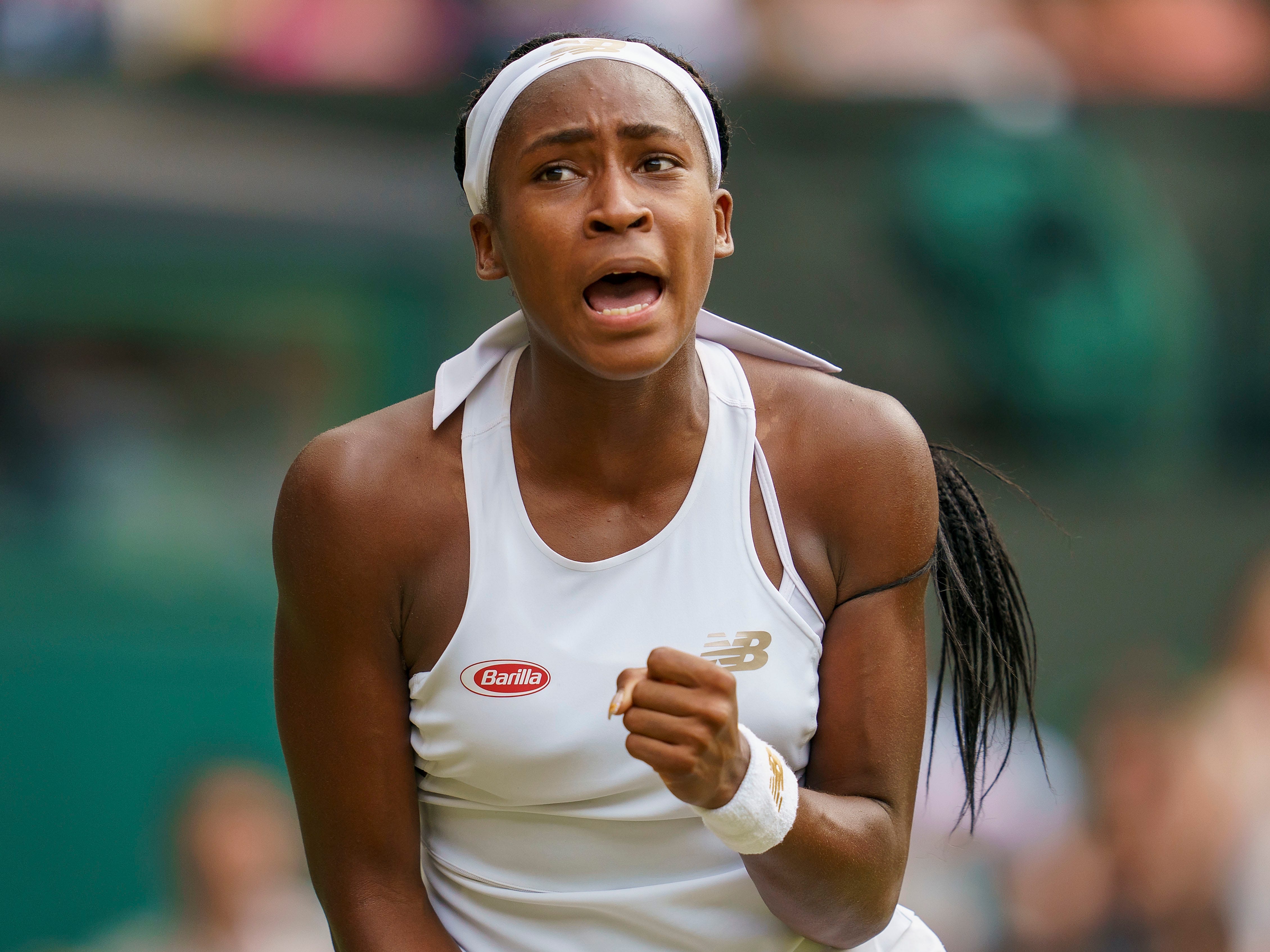 Coco Gauff reacts during her match against Polona Hercog during the third round of Wimbledon in 2019.