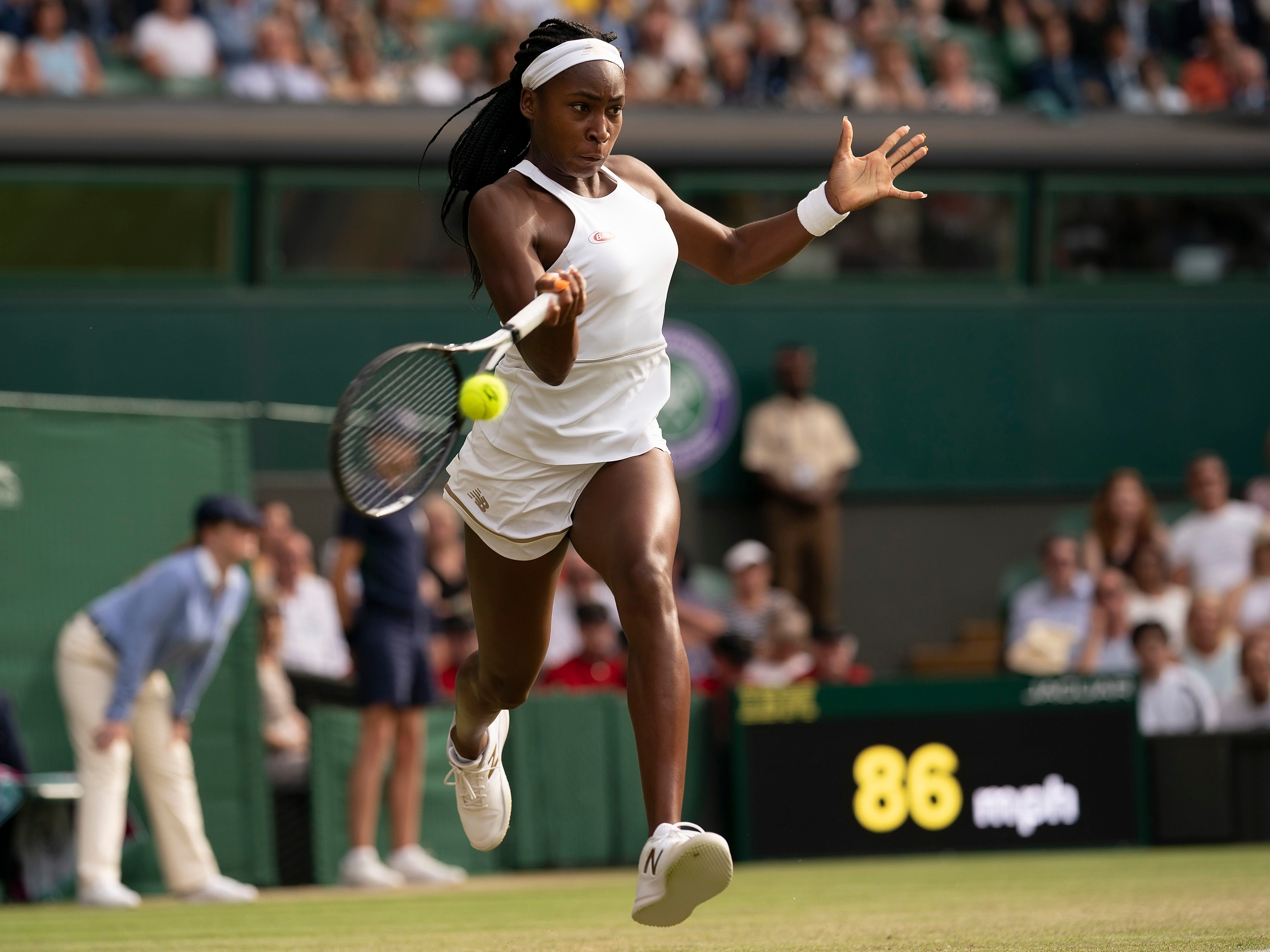 Coco Gauff hits the ball against Polona Hercog during their third-round match at Wimbledon in 2019.