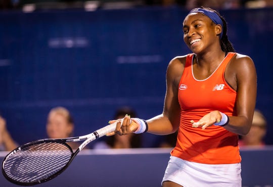 Coco Gauff jokes around during an exhibition match against Ashleigh Barty at the Winston-Salem Open on Aug. 21.