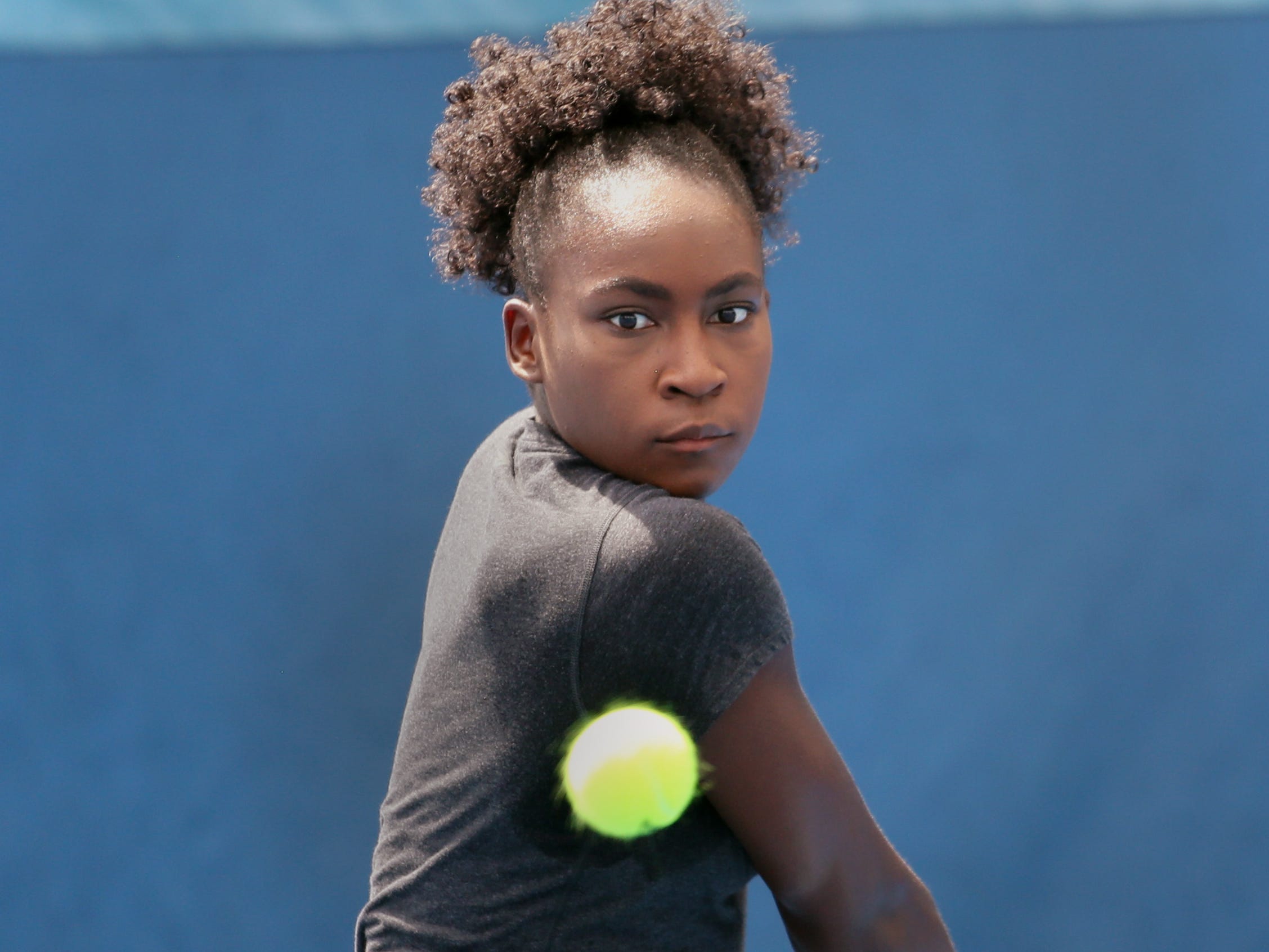 Coco Gauff works out and films a commercial for HEAD at the Delray Beach Tennis Center.