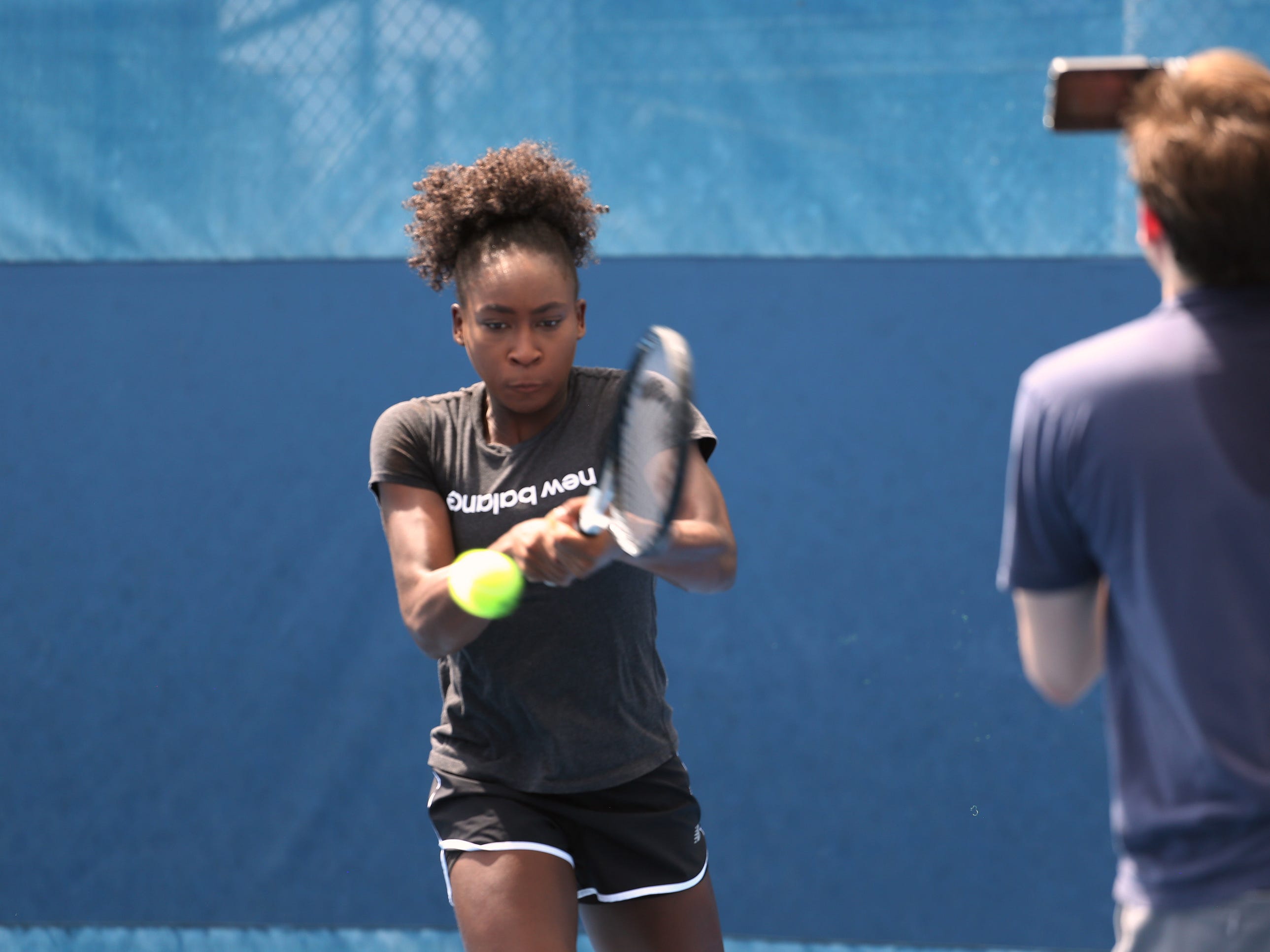 Coco Gauff works out and films a commercial for HEAD at the Delray Beach Tennis Center.