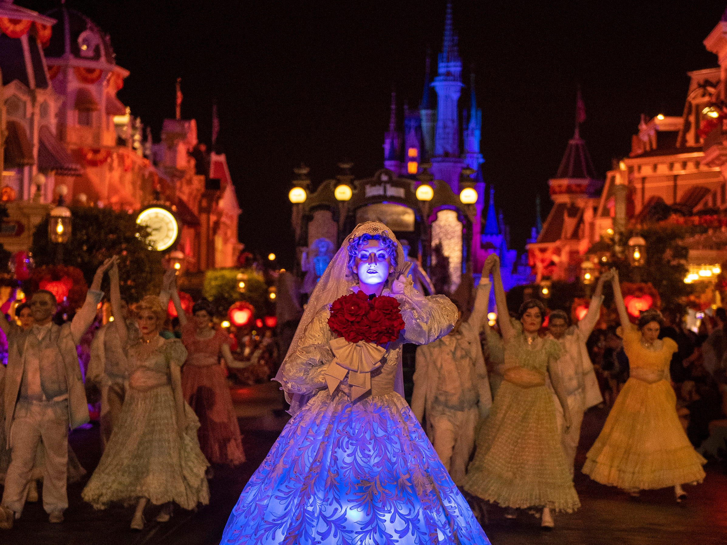 Mickey’s Boo-to-You Halloween Parade at Mickey’s Not-So-Scary Halloween Party- Caitlyn McCabe, Disney The spectral Bride from the Haunted Mansion makes her haunting debut this year in Mickey’s Boo-to-You Halloween Parade at Mickey’s Not-So-Scary Halloween Party. Her ghostly figure glides down Main Street among a throng of waltzing spirits during this fan-favorite parade. Mickey’s Not-So-Scary Halloween Party takes place on select nights, Aug. 16-Nov. 1, 2019, at Walt Disney World Resort in Lake Buena Vista, FL. (Caitlyn McCabe, photographer)