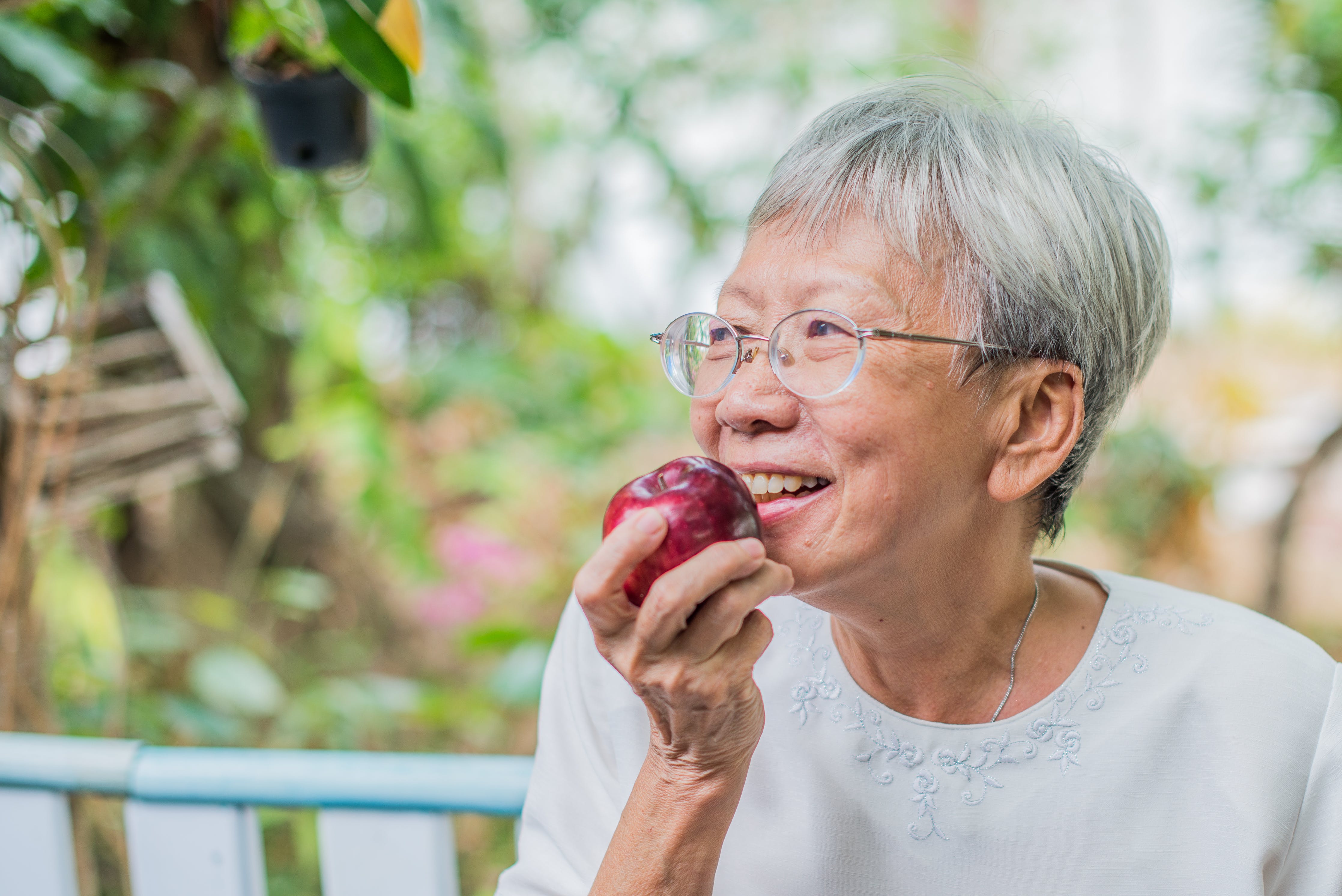 elderly woman eating