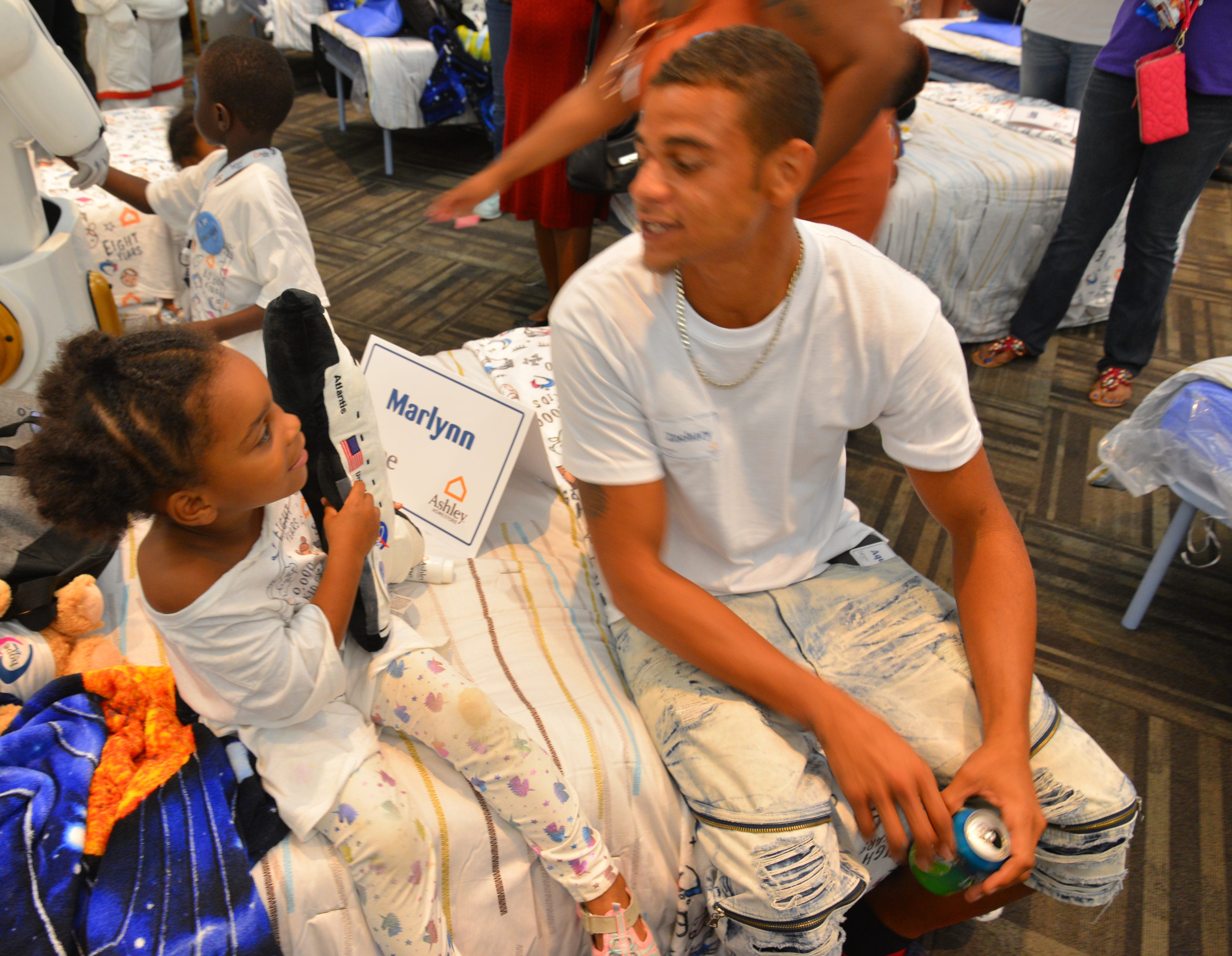 50 students from four Brevard schools were invited to Kennedy Space Center Visitor Complex Friday afternoon for the Ashley HomeStore’s national “Hope to Dream” program to surprise 50 children an afternoon at the Kennedy Space Center Visitor Complex, followed by a mass bed reveal, where kids will receive their very own bed. Children will receive a twin mattress, bed frame, pillow, comforter, mattress protector, swag bag and teddy bear. These children do not have their own bed, they either share with their parent or siblings, sleep on the sofa or on the floor. Ashley's HomeStore Hope to Dream program has given out 90,000 beds since 2010. 