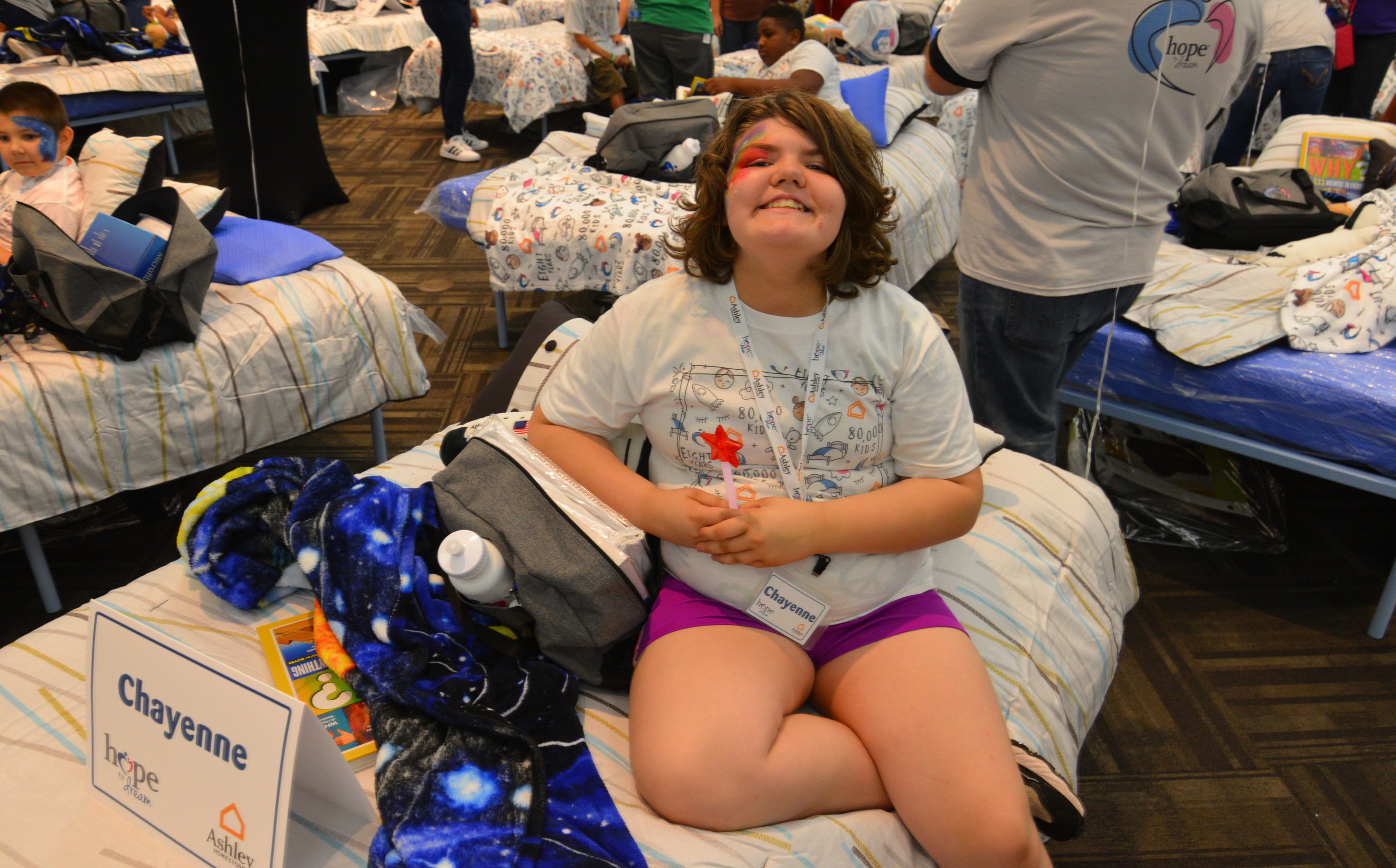 50 students from four Brevard schools were invited to Kennedy Space Center Visitor Complex Friday afternoon for the Ashley HomeStoreâ€™s national â€œHope to Dreamâ€ program to surprise 50 children an afternoon at the Kennedy Space Center Visitor Complex, followed by a mass bed reveal, where kids will receive their very own bed. Children will receive a twin mattress, bed frame, pillow, comforter, mattress protector, swag bag and teddy bear. These children do not have their own bed, they either share with their parent or siblings, sleep on the sofa or on the floor. Ashley's HomeStore Hope to Dream program has given out 90,000 beds since 2010. 