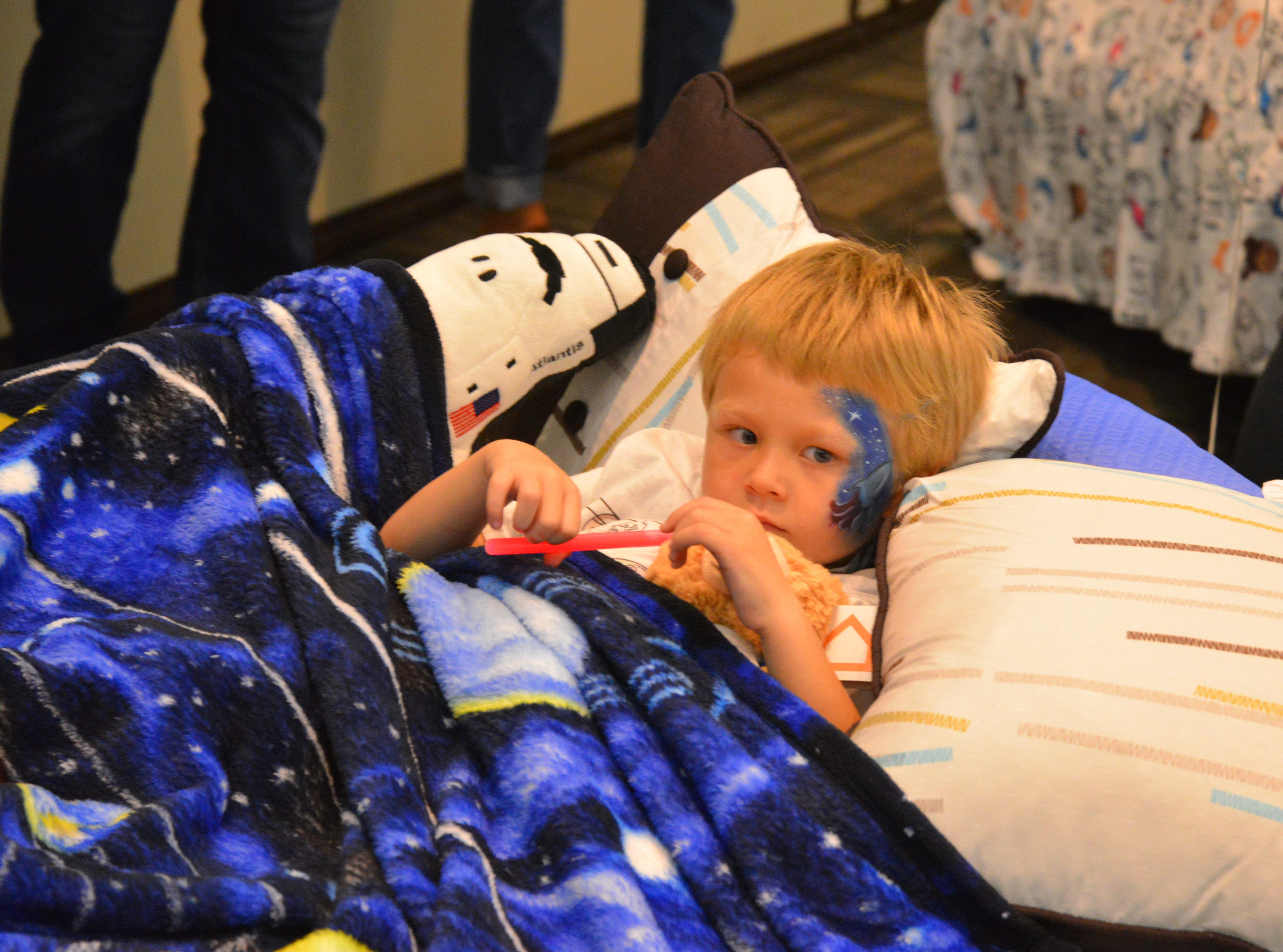 50 students from four Brevard schools were invited to Kennedy Space Center Visitor Complex Friday afternoon for the Ashley HomeStore’s national “Hope to Dream” program to surprise 50 children an afternoon at the Kennedy Space Center Visitor Complex, followed by a mass bed reveal, where kids will receive their very own bed. Children will receive a twin mattress, bed frame, pillow, comforter, mattress protector, swag bag and teddy bear. These children do not have their own bed, they either share with their parent or siblings, sleep on the sofa or on the floor. Ashley's HomeStore Hope to Dream program has given out 90,000 beds since 2010. 