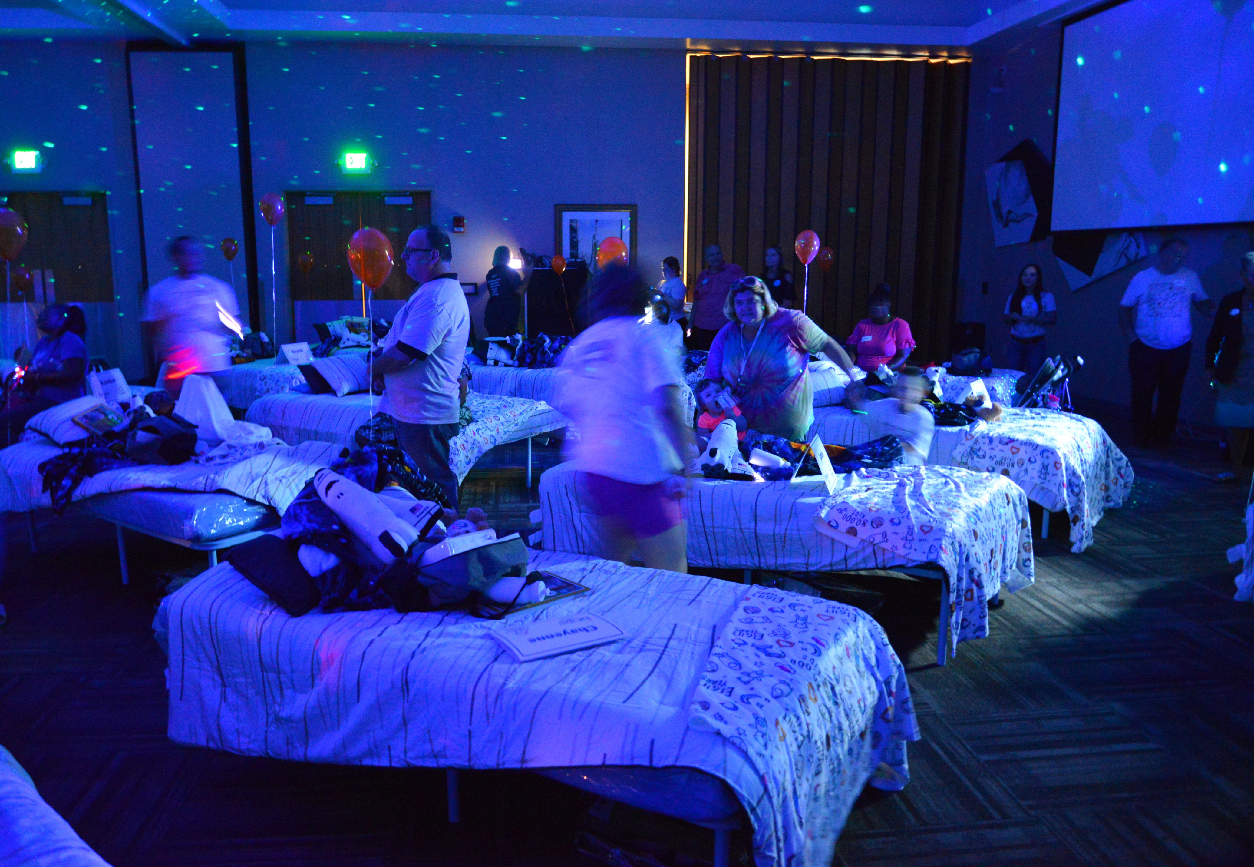 50 students from four Brevard schools were invited to Kennedy Space Center Visitor Complex Friday afternoon for the Ashley HomeStore’s national “Hope to Dream” program to surprise 50 children an afternoon at the Kennedy Space Center Visitor Complex, followed by a mass bed reveal, where kids will receive their very own bed. Children will receive a twin mattress, bed frame, pillow, comforter, mattress protector, swag bag and teddy bear. These children do not have their own bed, they either share with their parent or siblings, sleep on the sofa or on the floor. Ashley's HomeStore Hope to Dream program has given out 90,000 beds since 2010. 
