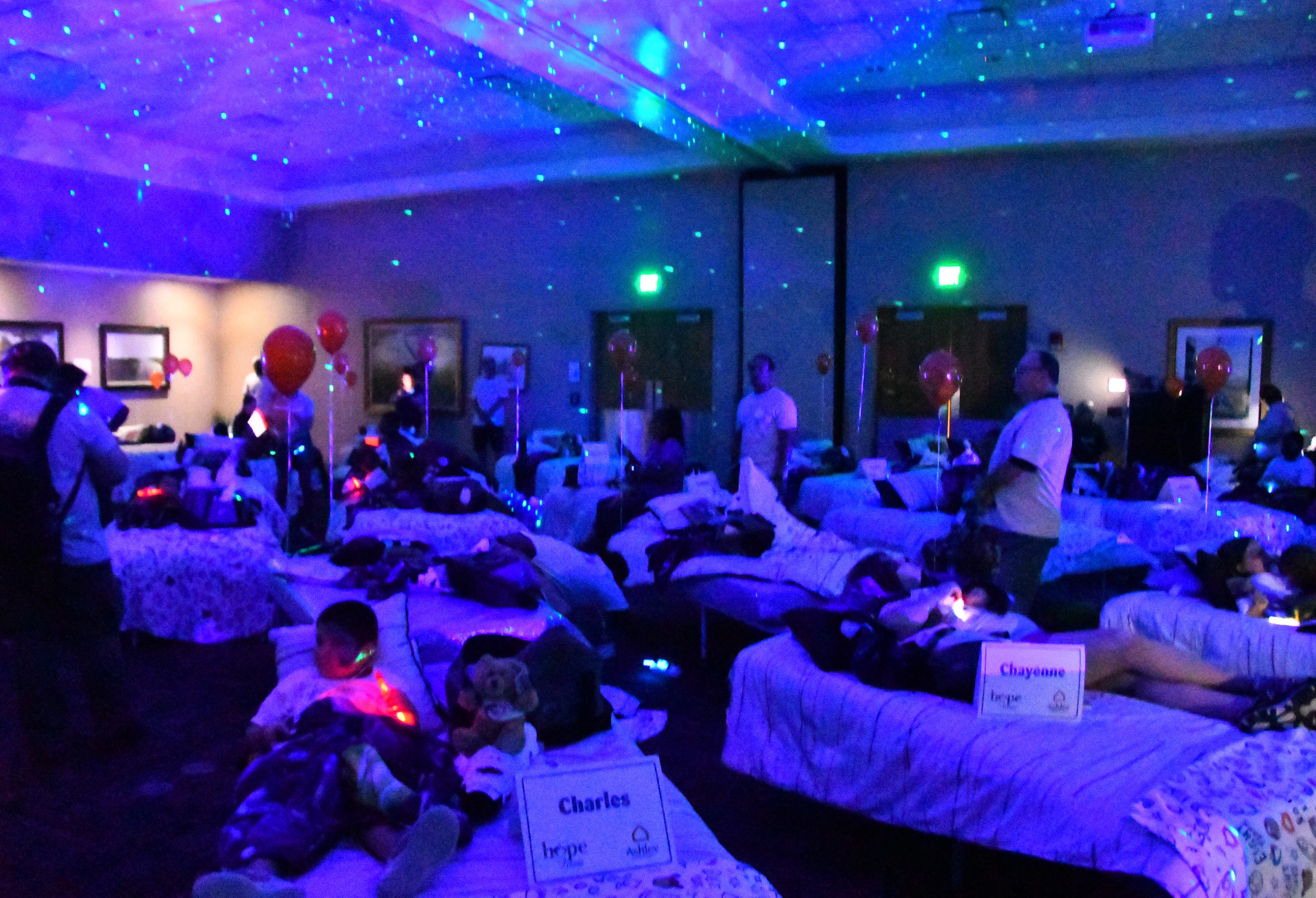 50 students from four Brevard schools were invited to Kennedy Space Center Visitor Complex Friday afternoon for the Ashley HomeStore’s national “Hope to Dream” program to surprise 50 children an afternoon at the Kennedy Space Center Visitor Complex, followed by a mass bed reveal, where kids will receive their very own bed. Children will receive a twin mattress, bed frame, pillow, comforter, mattress protector, swag bag and teddy bear. These children do not have their own bed, they either share with their parent or siblings, sleep on the sofa or on the floor. Ashley's HomeStore Hope to Dream program has given out 90,000 beds since 2010. 