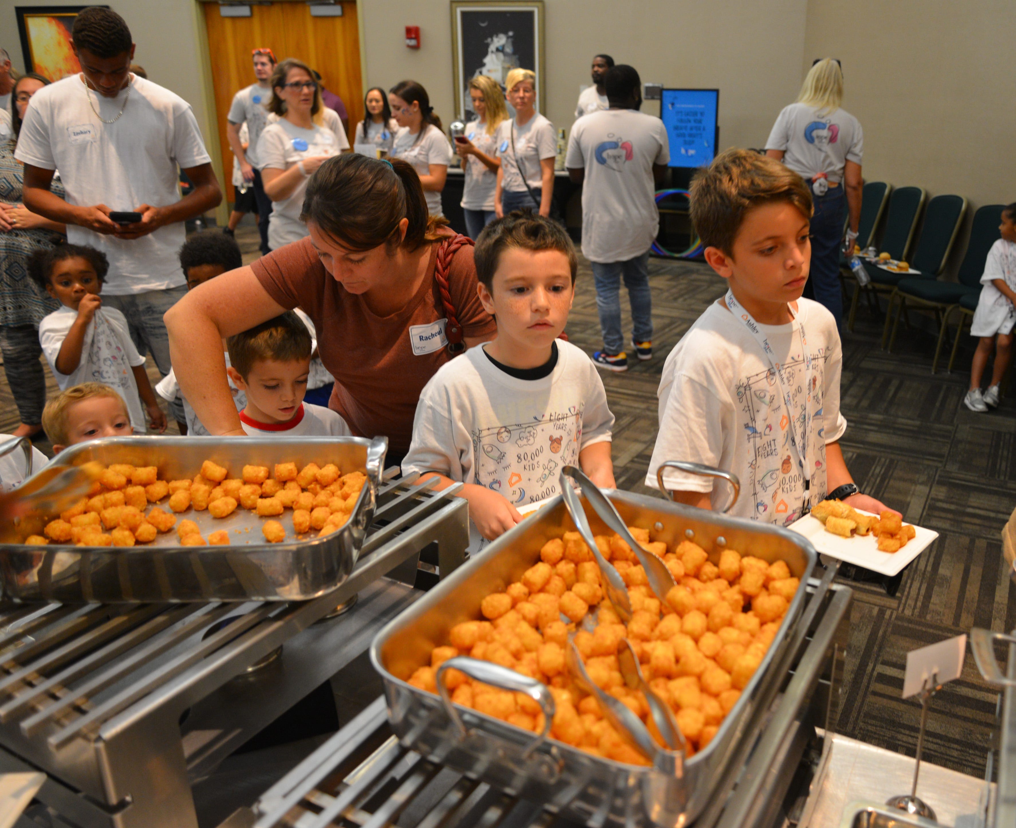 50 students from four Brevard schools were invited to Kennedy Space Center Visitor Complex Friday afternoon for the Ashley HomeStoreâ€™s national â€œHope to Dreamâ€ program to surprise 50 children an afternoon at the Kennedy Space Center Visitor Complex, followed by a mass bed reveal, where kids will receive their very own bed. Children will receive a twin mattress, bed frame, pillow, comforter, mattress protector, swag bag and teddy bear. These children do not have their own bed, they either share with their parent or siblings, sleep on the sofa or on the floor. Ashley's HomeStore Hope to Dream program has given out 90,000 beds since 2010. 