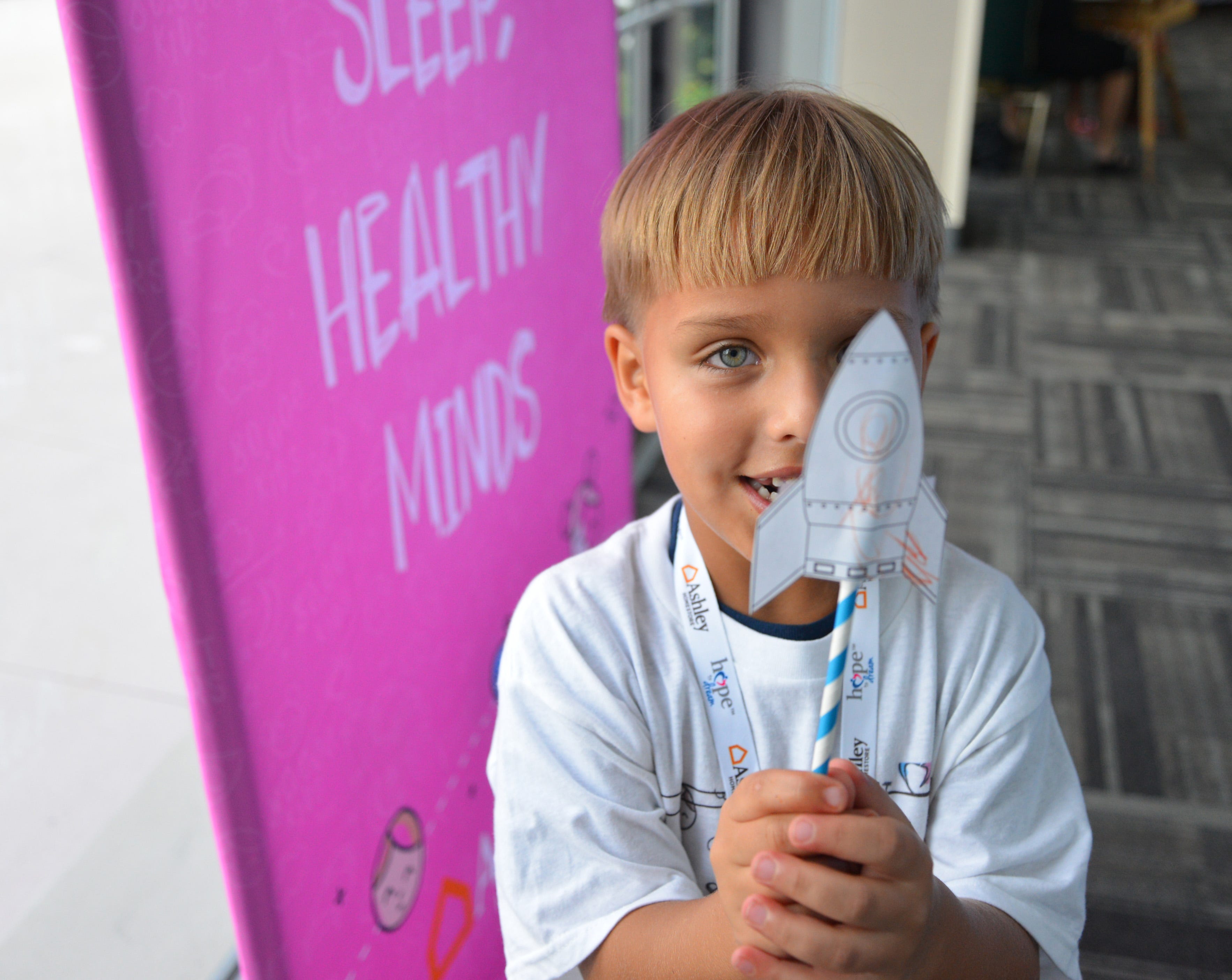 50 students from four Brevard schools were invited to Kennedy Space Center Visitor Complex Friday afternoon for the Ashley HomeStore’s national “Hope to Dream” program to surprise 50 children an afternoon at the Kennedy Space Center Visitor Complex, followed by a mass bed reveal, where kids will receive their very own bed. Children will receive a twin mattress, bed frame, pillow, comforter, mattress protector, swag bag and teddy bear. These children do not have their own bed, they either share with their parent or siblings, sleep on the sofa or on the floor. Ashley's HomeStore Hope to Dream program has given out 90,000 beds since 2010. 