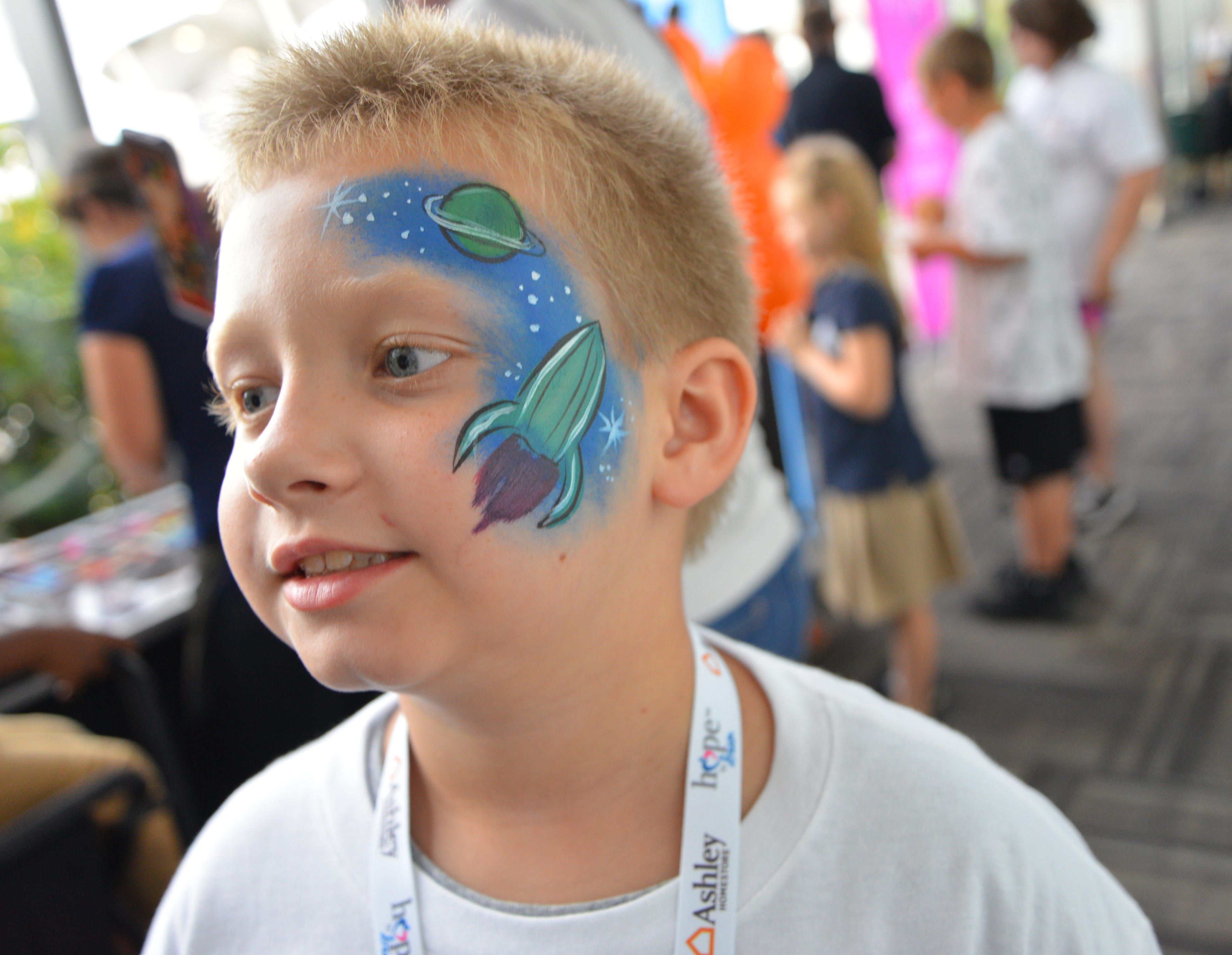 50 students from four Brevard schools were invited to Kennedy Space Center Visitor Complex Friday afternoon for the Ashley HomeStore’s national “Hope to Dream” program to surprise 50 children an afternoon at the Kennedy Space Center Visitor Complex, followed by a mass bed reveal, where kids will receive their very own bed. Children will receive a twin mattress, bed frame, pillow, comforter, mattress protector, swag bag and teddy bear. These children do not have their own bed, they either share with their parent or siblings, sleep on the sofa or on the floor. Ashley's HomeStore Hope to Dream program has given out 90,000 beds since 2010. 