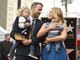 Actor Ryan Reynolds poses with his wife, actress Blake