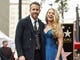 Actor Ryan Reynolds, left, and his wife, actress Blake