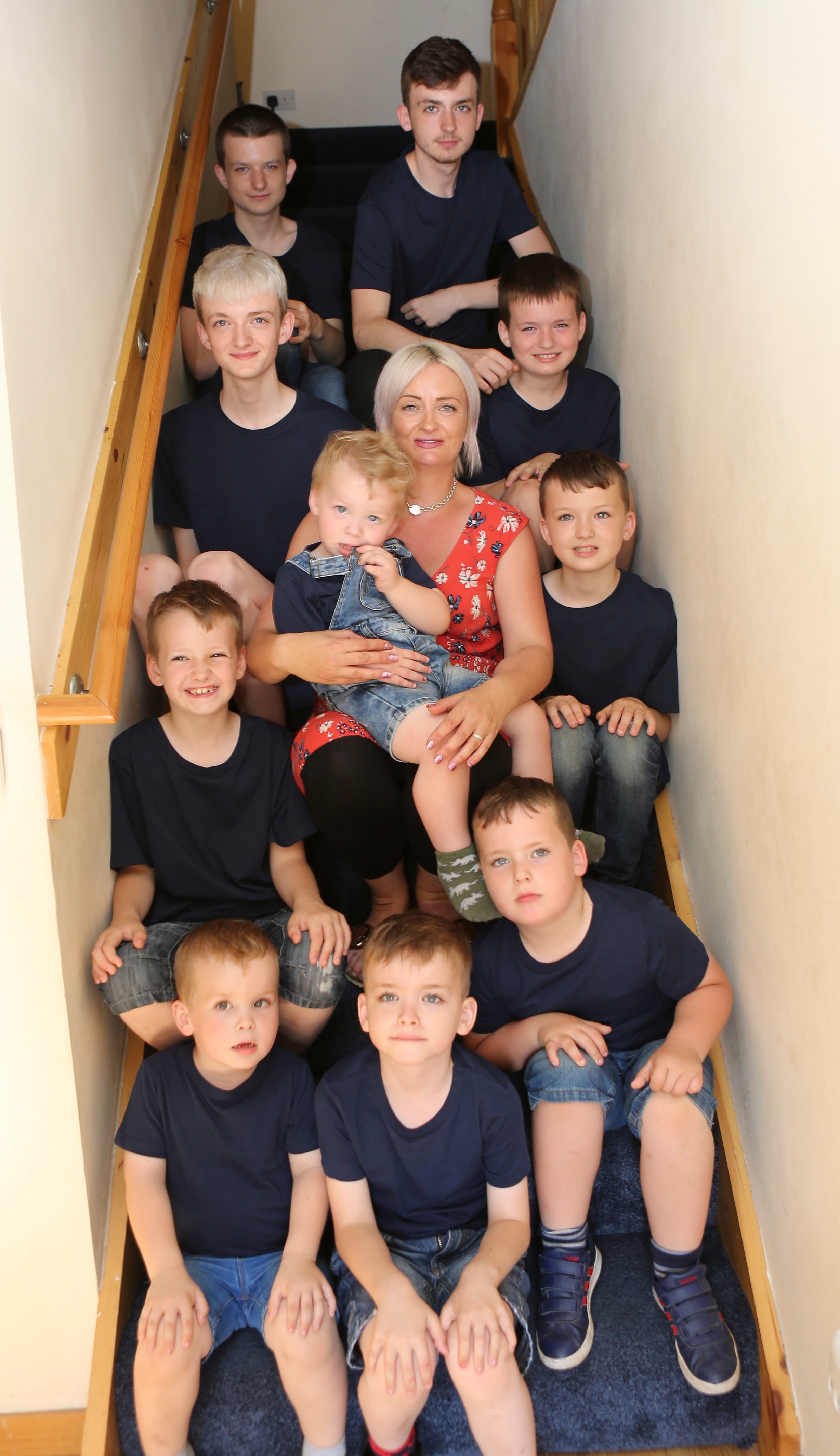 Alexis Brett welcomed 10 sons before she discovered she was pregnant with another baby.