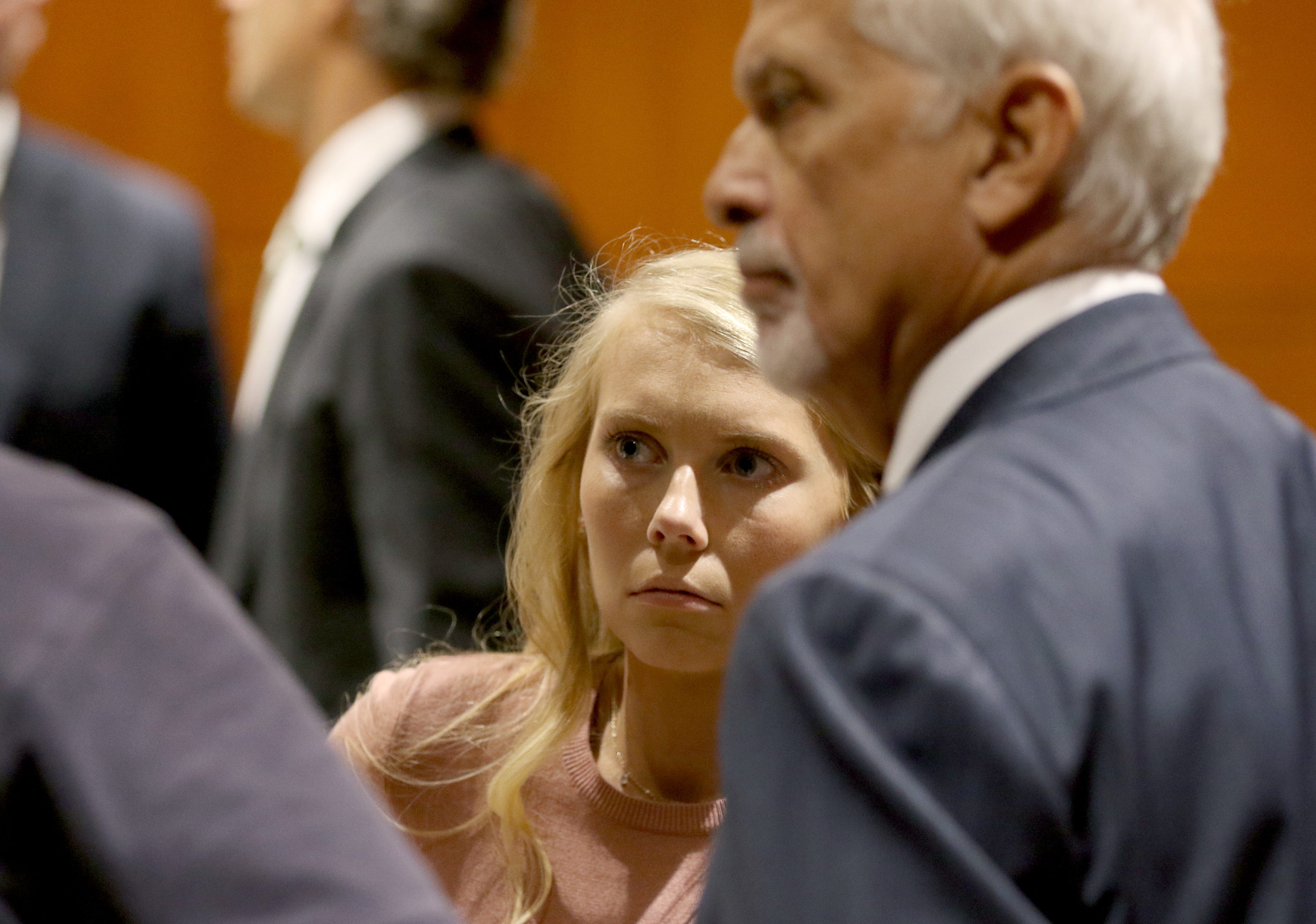 Brooke "Skylar" Richardson, talks with her attorney Charlie H. Rittgers during a break from jury selection at the Warren County Courthouse Tuesday, September 3, 2019. Richardson, 20, is accused of killing and burying her baby in the backyard of her Carlisle home. Richardson is charged with aggravated murder, involuntary manslaughter, gross abuse of a corpse, tampering with evidence and child endangerment in the death of her newborn infant.