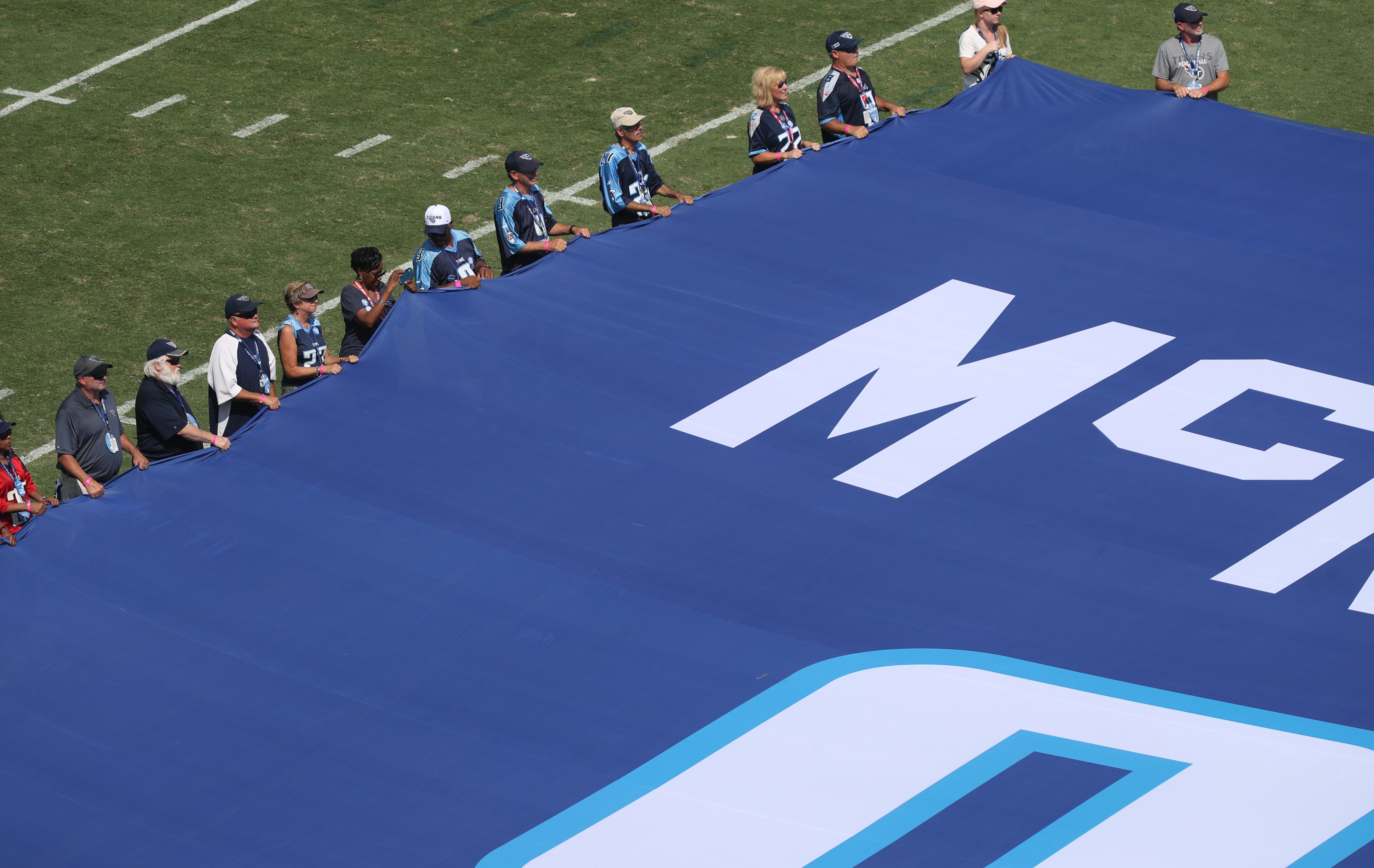 Jersey numbers for former Tennessee Titans stars Steve McNair and Eddie George are retired during a halftime ceremony at Nissan Stadium Sunday, Sept. 15, 2019 in Nashville, Tenn. 