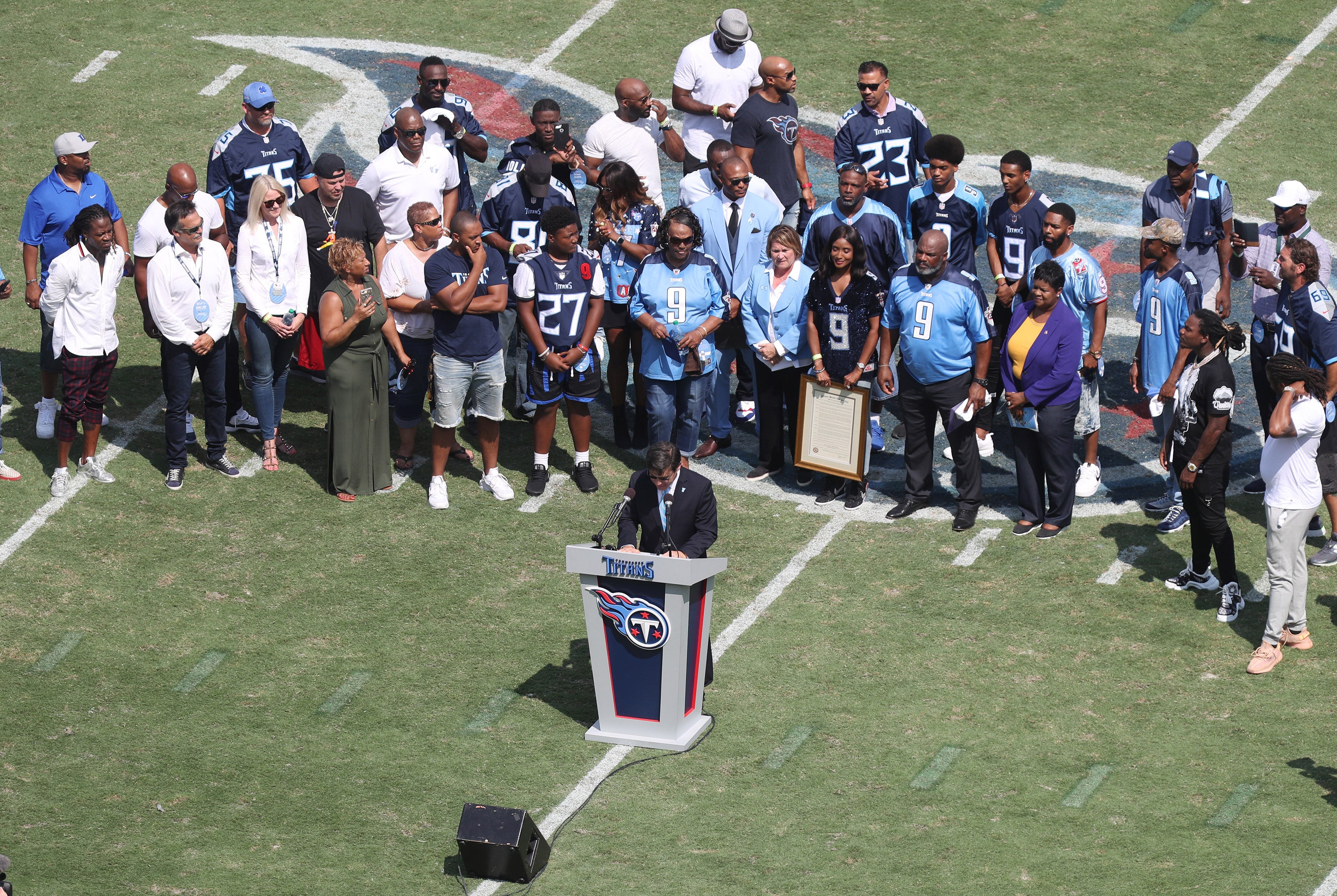Jersey numbers for former Tennessee Titans stars Steve McNair and Eddie George are retired during a halftime ceremony at Nissan Stadium Sunday, Sept. 15, 2019 in Nashville, Tenn. 