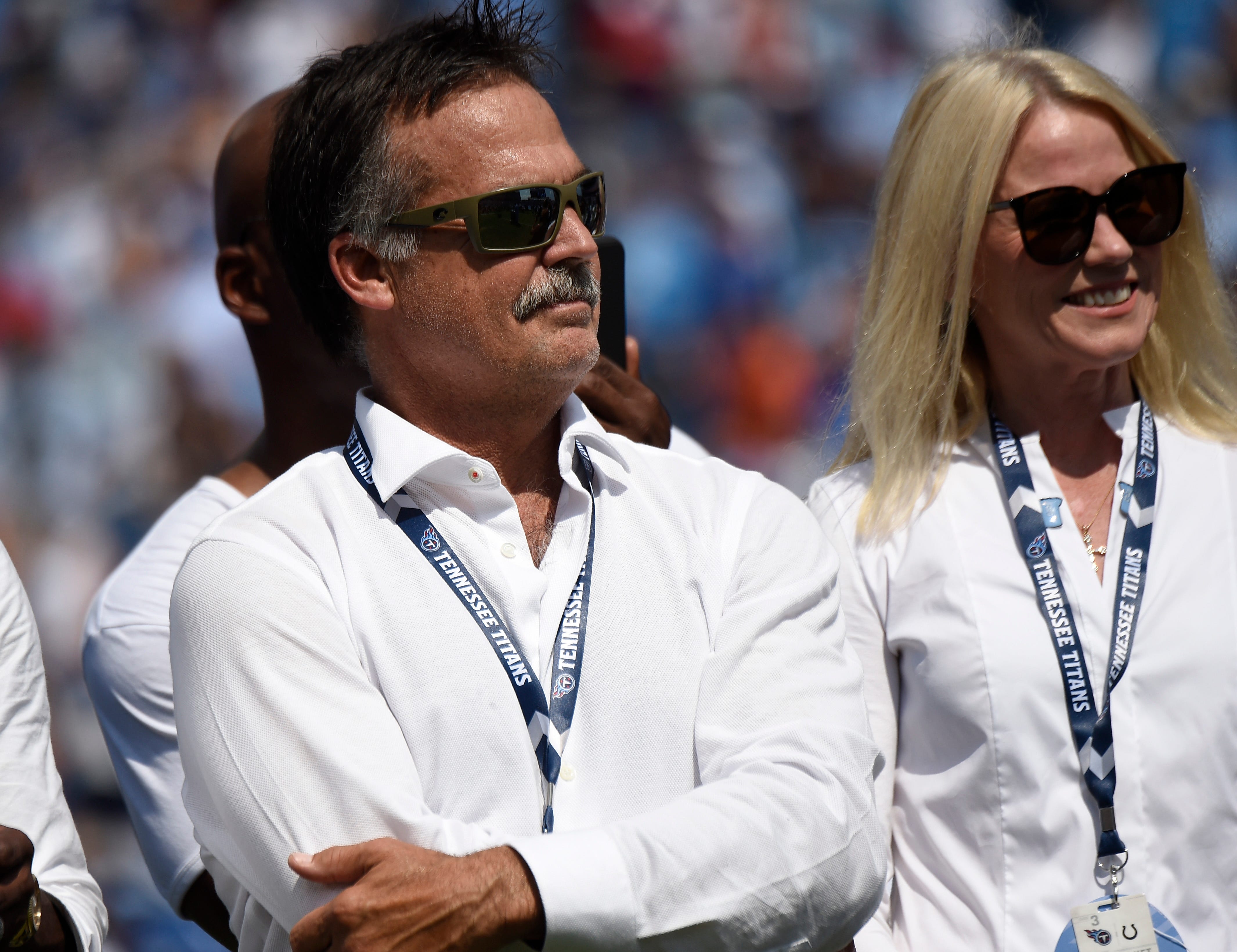 Former Titans head coach listens to the halftime ceremony retiring the jersey numbers of Eddie George and Steve McNair at Nissan Stadium Sunday, Sept. 15, 2019 in Nashville, Tenn. 