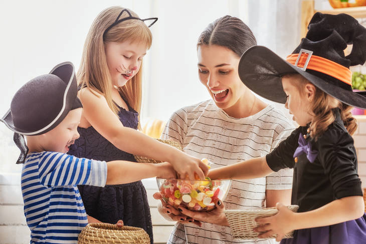 Mom with kids during Halloween