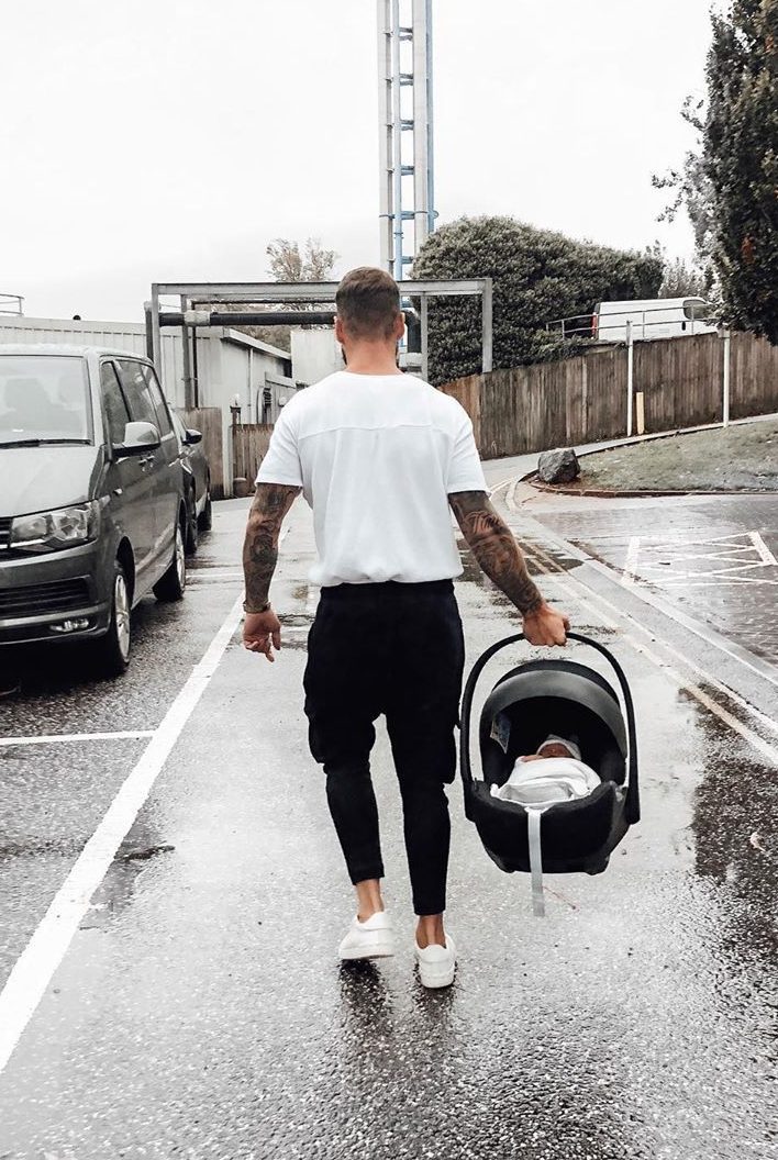  Dom was shown walking through a car park with the baby