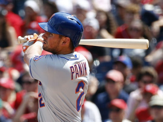 New York Mets' Joe Panik doubles in the second inning of a baseball game against the Washington Nationals, Monday, Sept. 2, 2019, in Washington. J.D. Davis scored on the play. (AP Photo/Patrick Semansky)