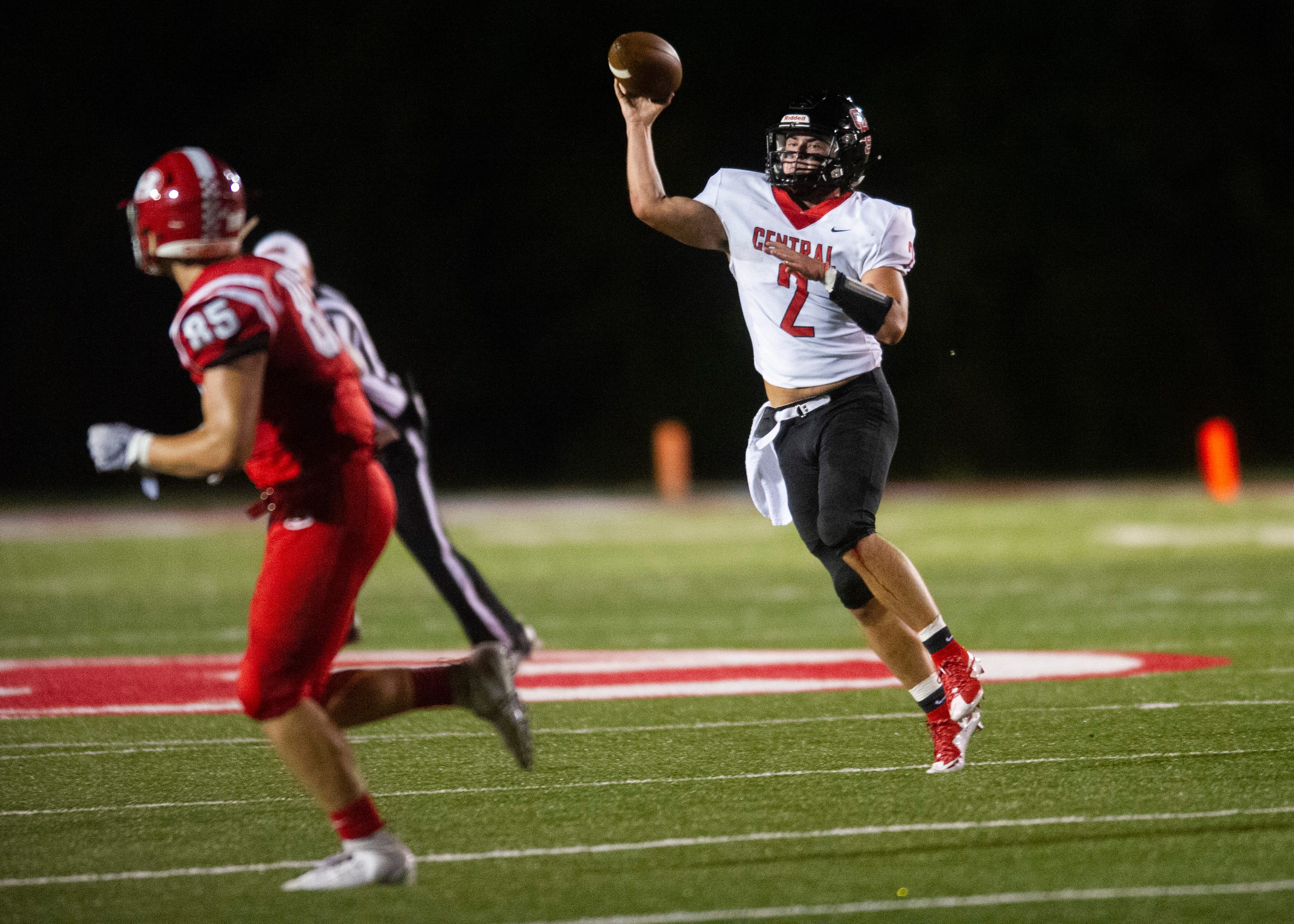 Central's Dakota Fawver (2) prepress to throw the ball during the Halls and Central high school football game on Friday, October 4, 2019 at Halls High School.
