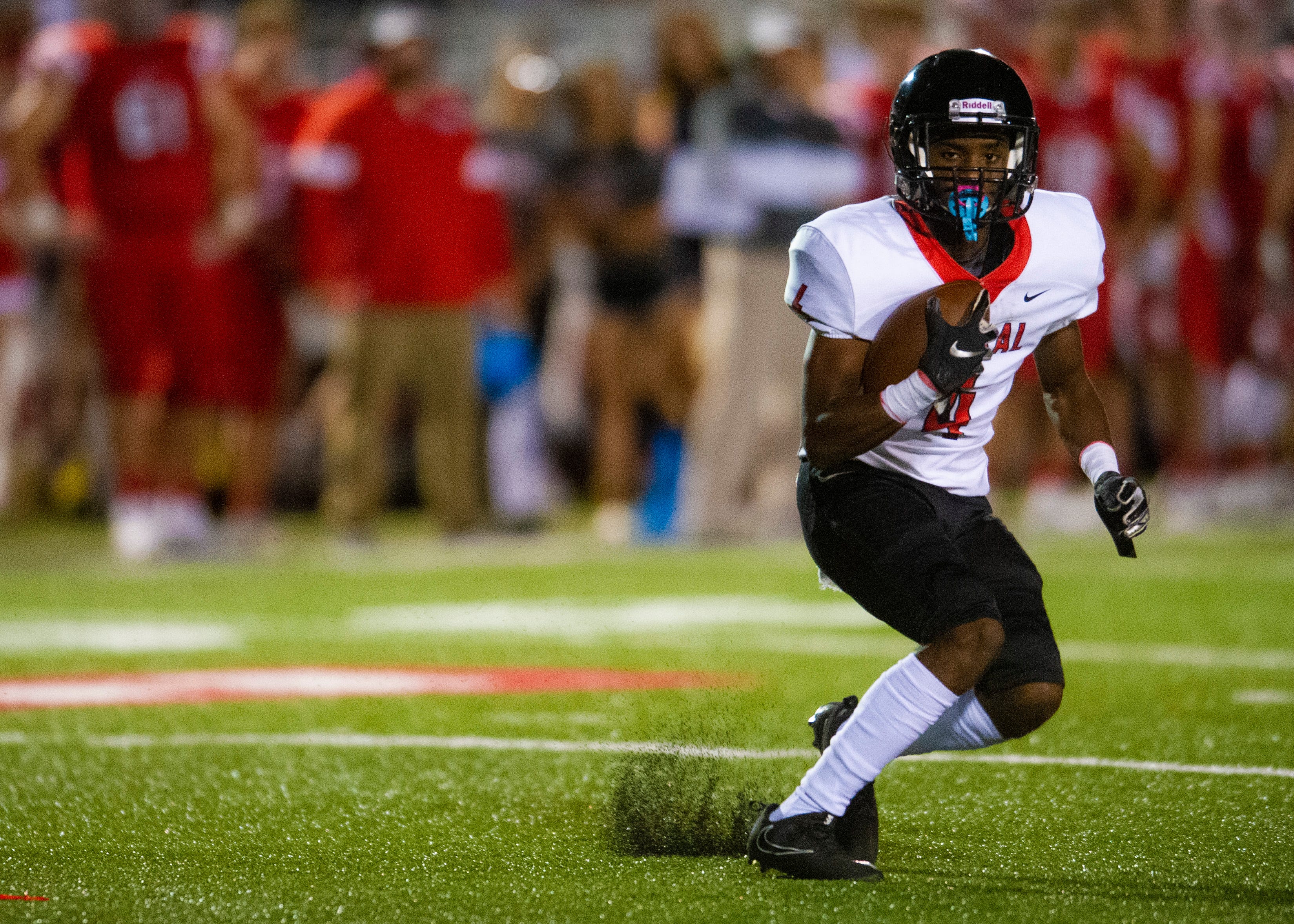 Central's Jonathan Mynatt (4) runs with the ball during the Halls and Central high school football game on Friday, October 4, 2019 at Halls High School.