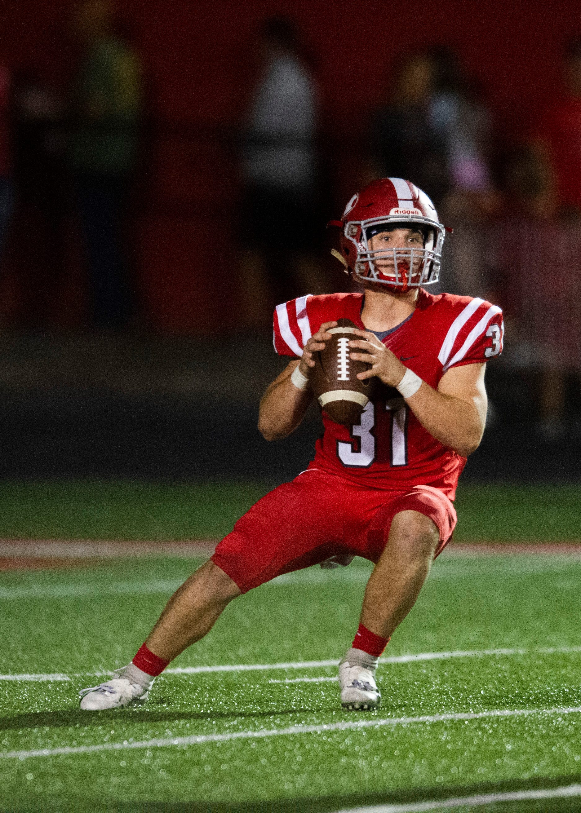 Halls' Brett McMahan (31) looks for a pass during the Halls and Central high school football game on Friday, October 4, 2019 at Halls High School.