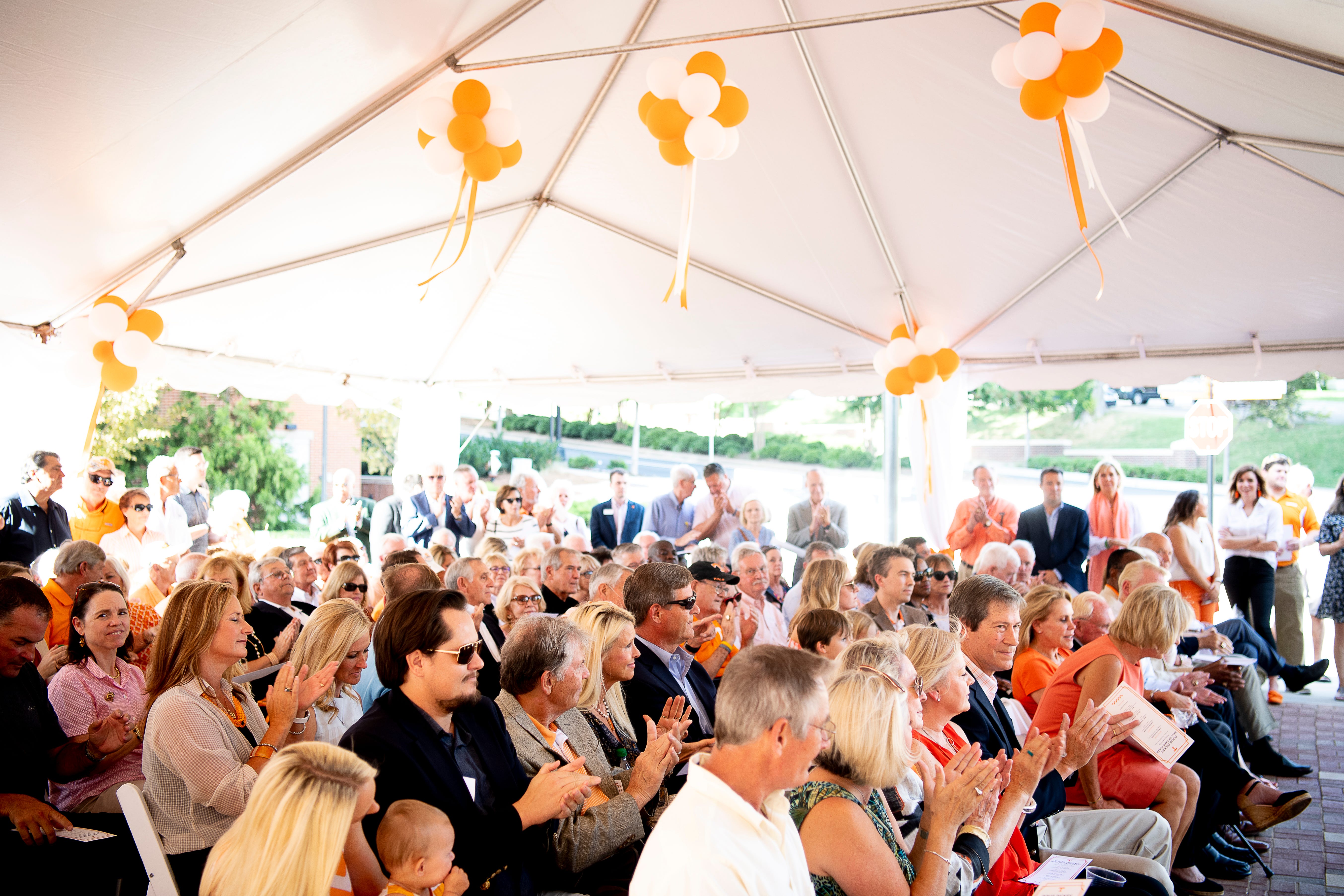Attendees listen during a dedication ceremony of the Doug Dickey Hall of Fame Plaza at the Neyland-Thompson Sports Complex in Knoxville, Tennessee on Friday, October 4, 2019. Dickey led UT to its second SEC title in 1969 and served as the Vols' Director of Athletics from 1986 to 2003.