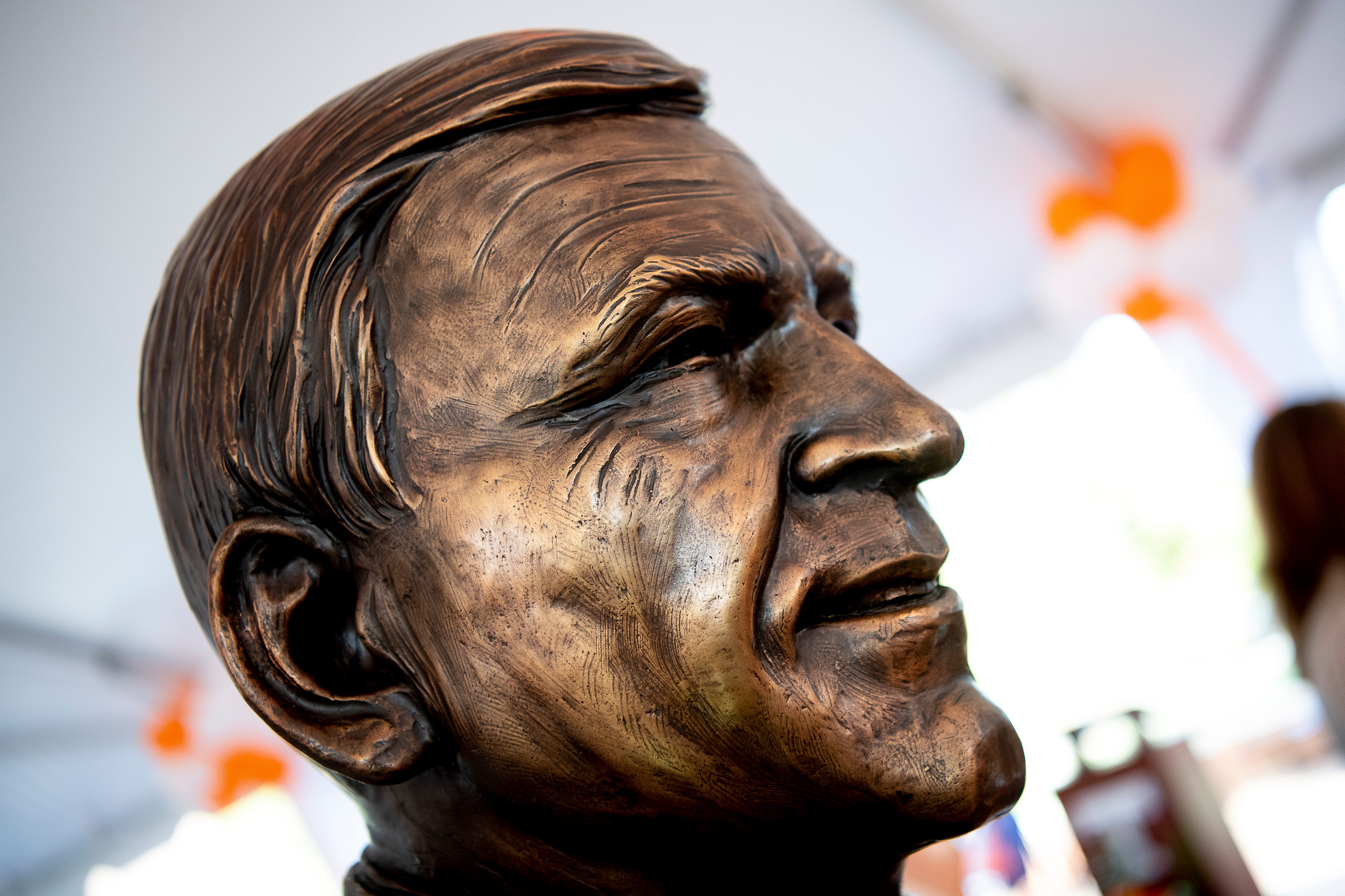 A bust of former Tennessee football coach Doug Dickey is unveiled during a dedication ceremony of the Doug Dickey Hall of Fame Plaza at the Neyland-Thompson Sports Complex in Knoxville, Tennessee on Friday, October 4, 2019. Dickey led UT to its second SEC title in 1969 and served as the Vols' Director of Athletics from 1986 to 2003.