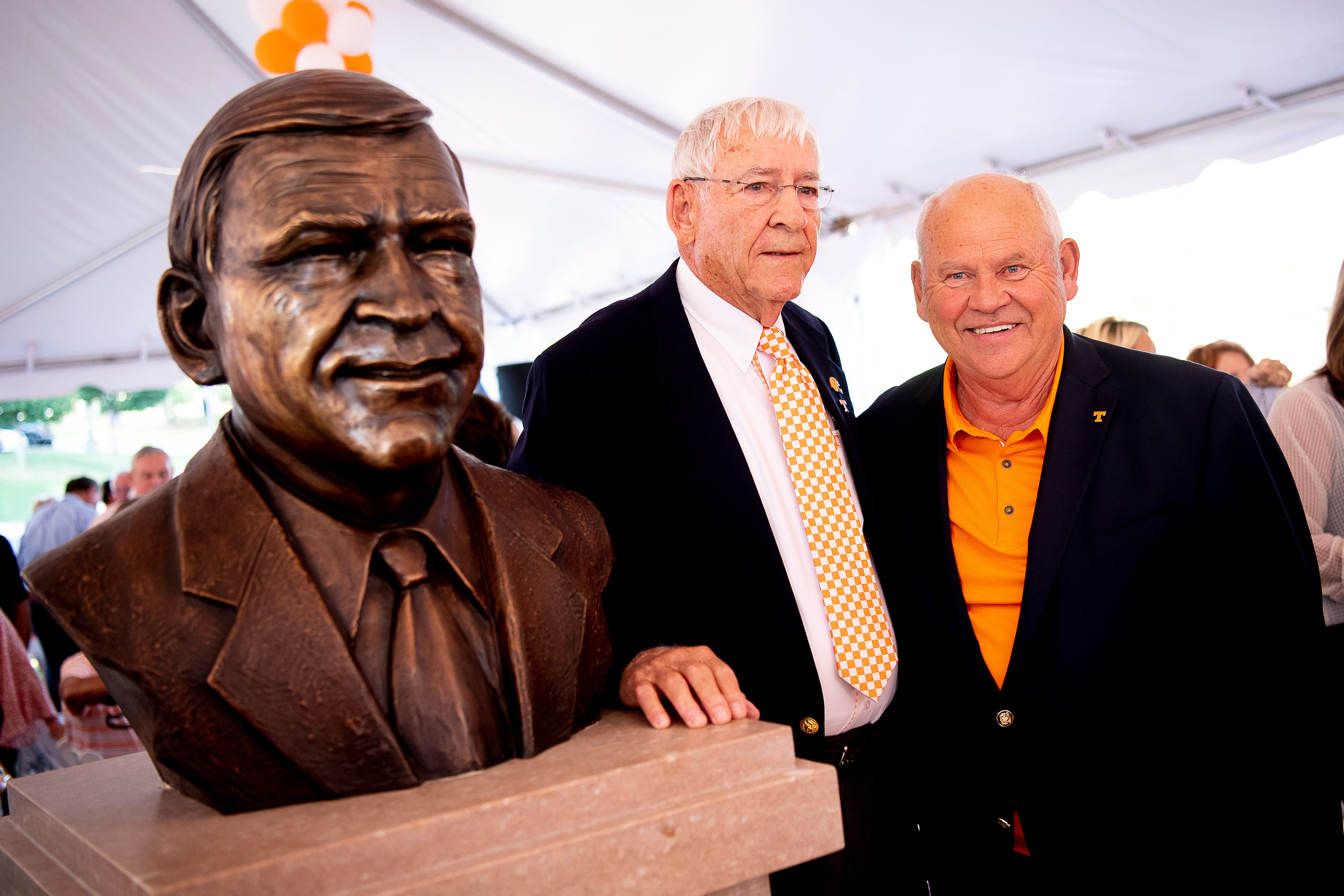 Phillip Fulmer and Doug Dickey stand beside a newly unveiled bust of Dickey during a dedication ceremony of the Doug Dickey Hall of Fame Plaza at the Neyland-Thompson Sports Complex in Knoxville, Tennessee on Friday, October 4, 2019. Dickey led UT to its second SEC title in 1969 and served as the Vols' Director of Athletics from 1986 to 2003.
