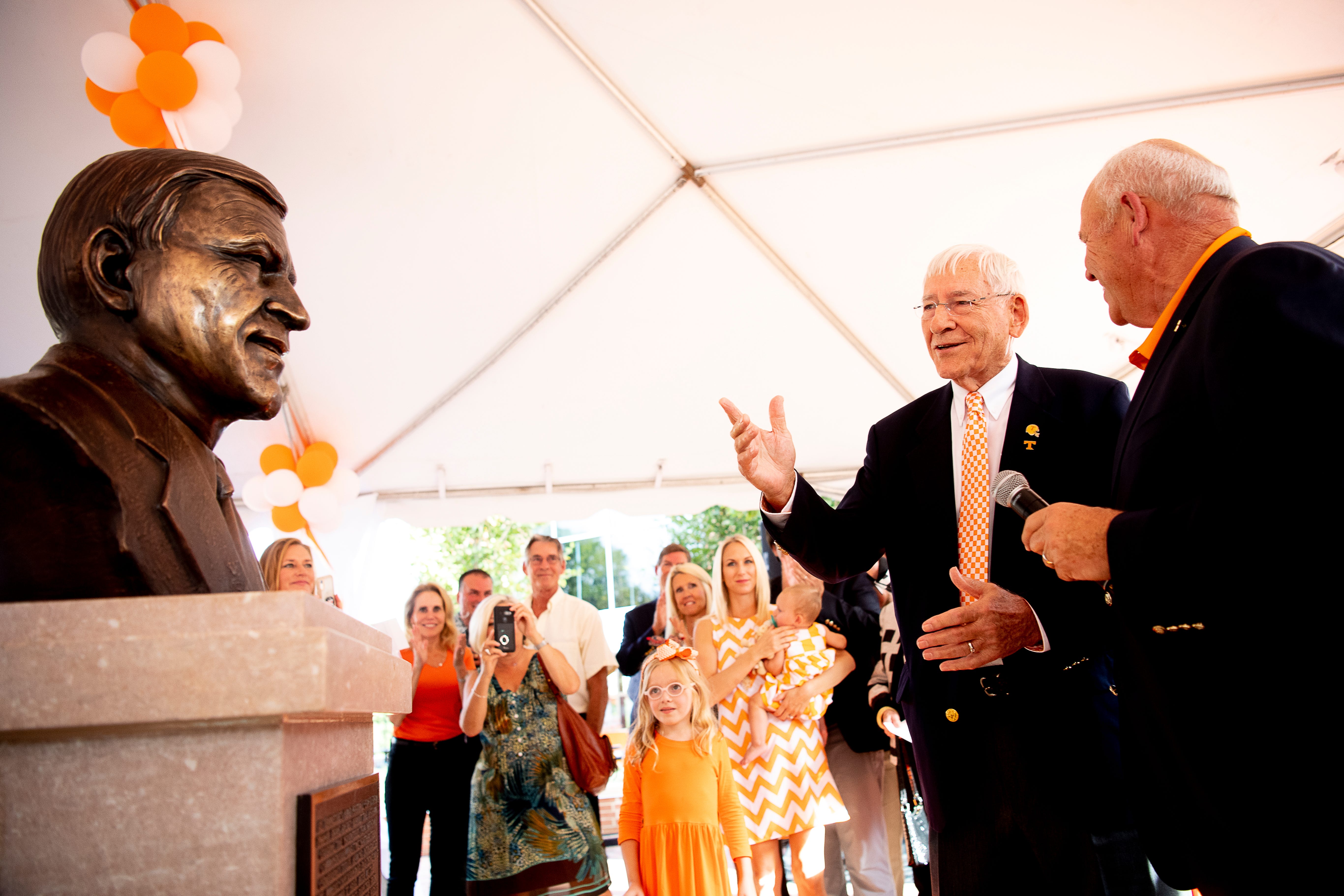 Phillip Fulmer and Doug Dickey unveil a bust of Dickey during a dedication ceremony of the Doug Dickey Hall of Fame Plaza at the Neyland-Thompson Sports Complex in Knoxville, Tennessee on Friday, October 4, 2019. Dickey led UT to its second SEC title in 1969 and served as the Vols' Director of Athletics from 1986 to 2003.