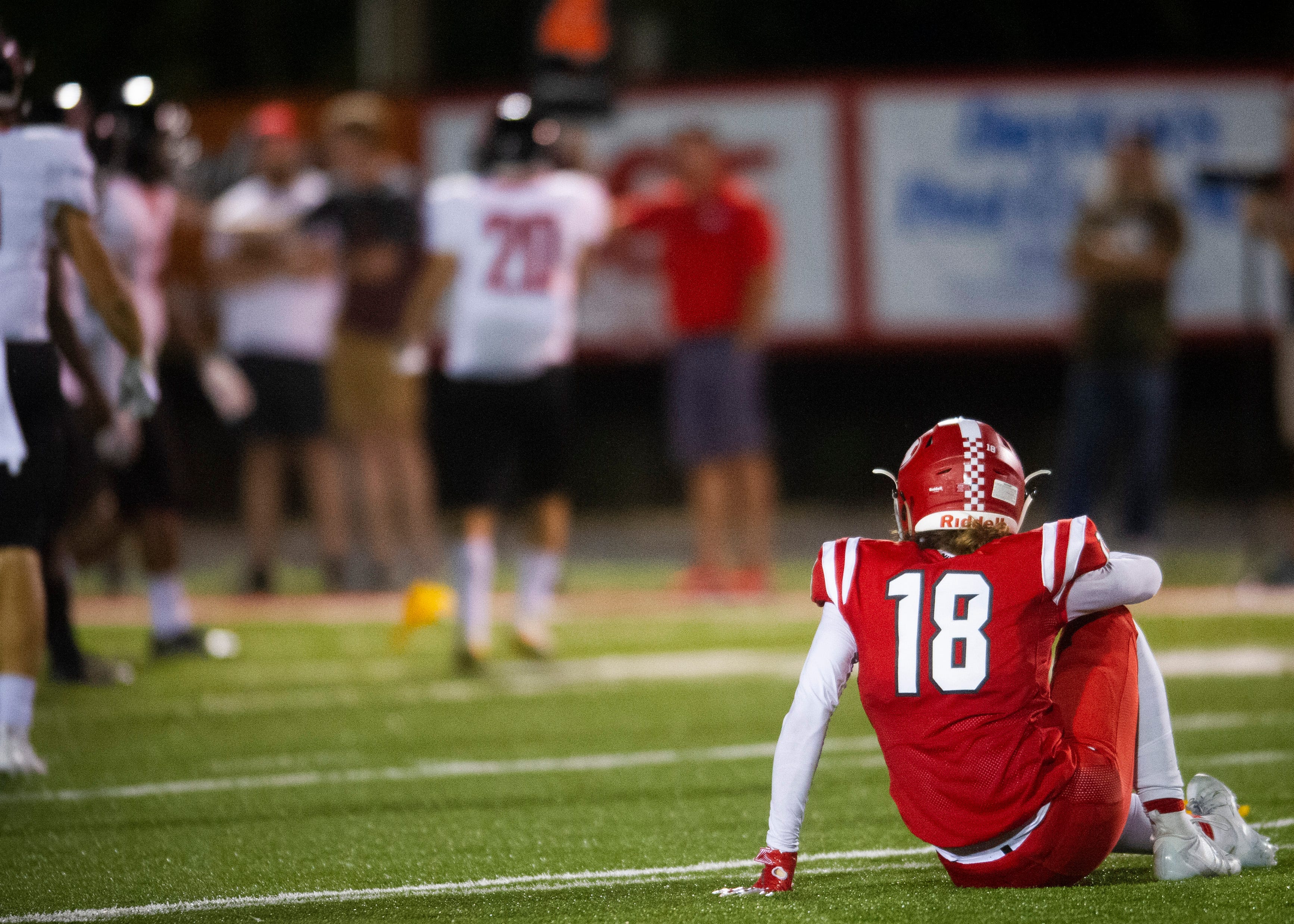 Halls' Jayden White (18) after a play during the Halls and Central high school football game on Friday, October 4, 2019 at Halls High School.