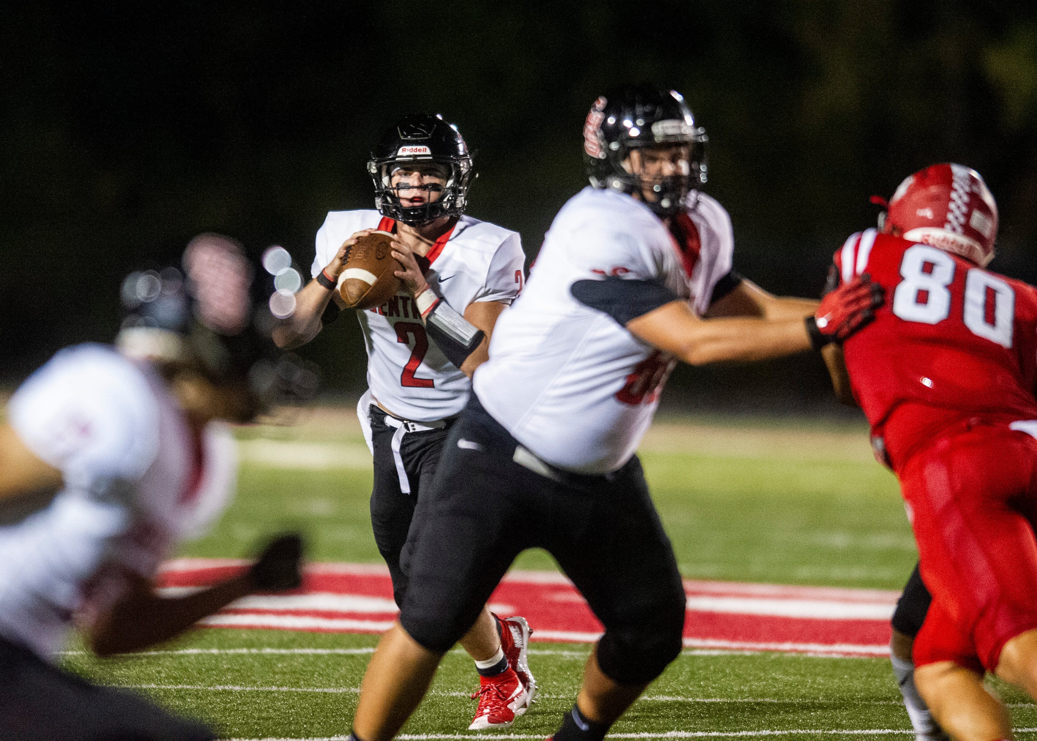 Central's Dakota Fawver (2) looks for a pass during the Halls and Central high school football game on Friday, October 4, 2019 at Halls High School.