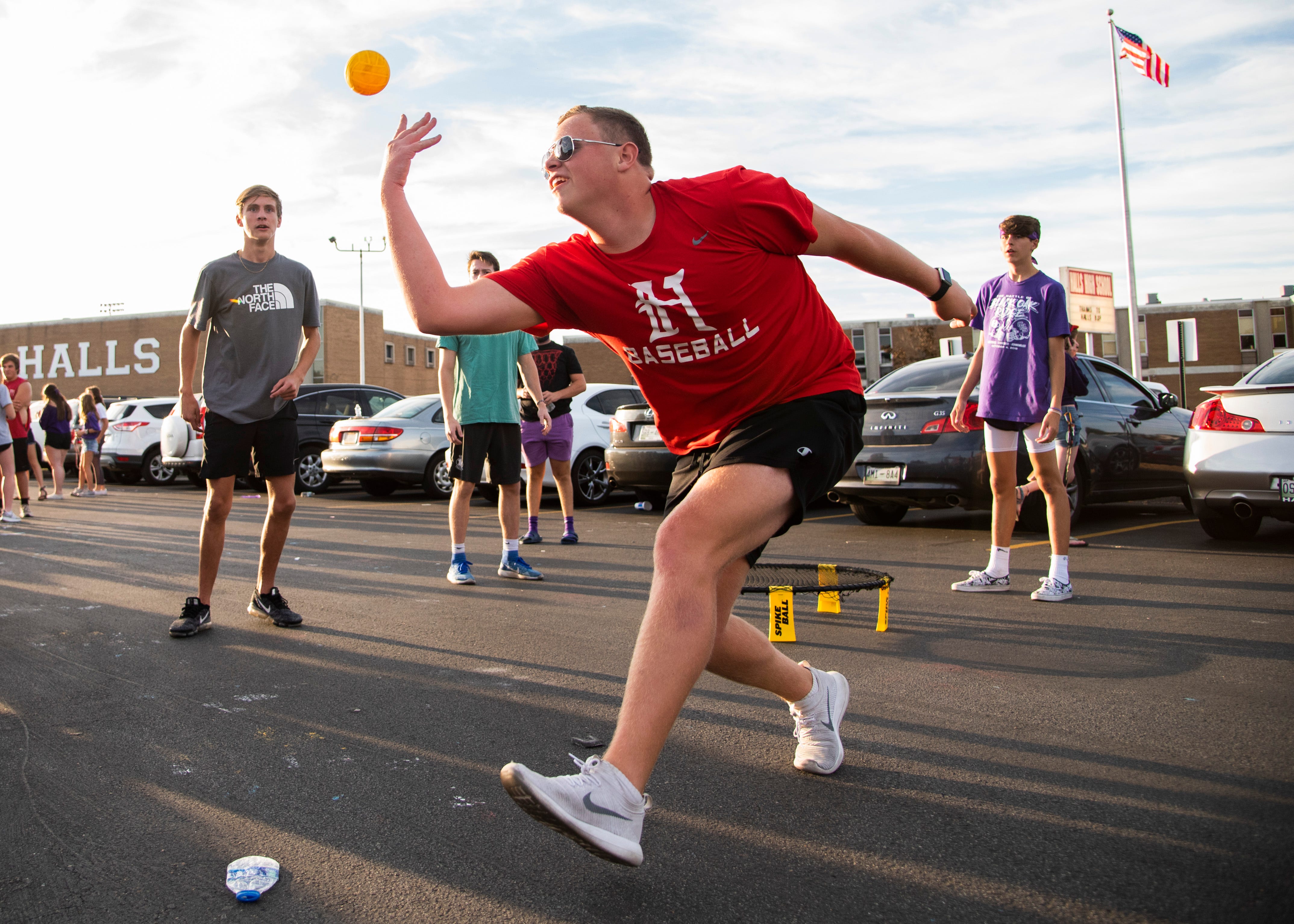 Halls senior, Dawson Langston plays spike ball before the Halls and Central high school football game on Friday, October 4, 2019 at Halls High School.