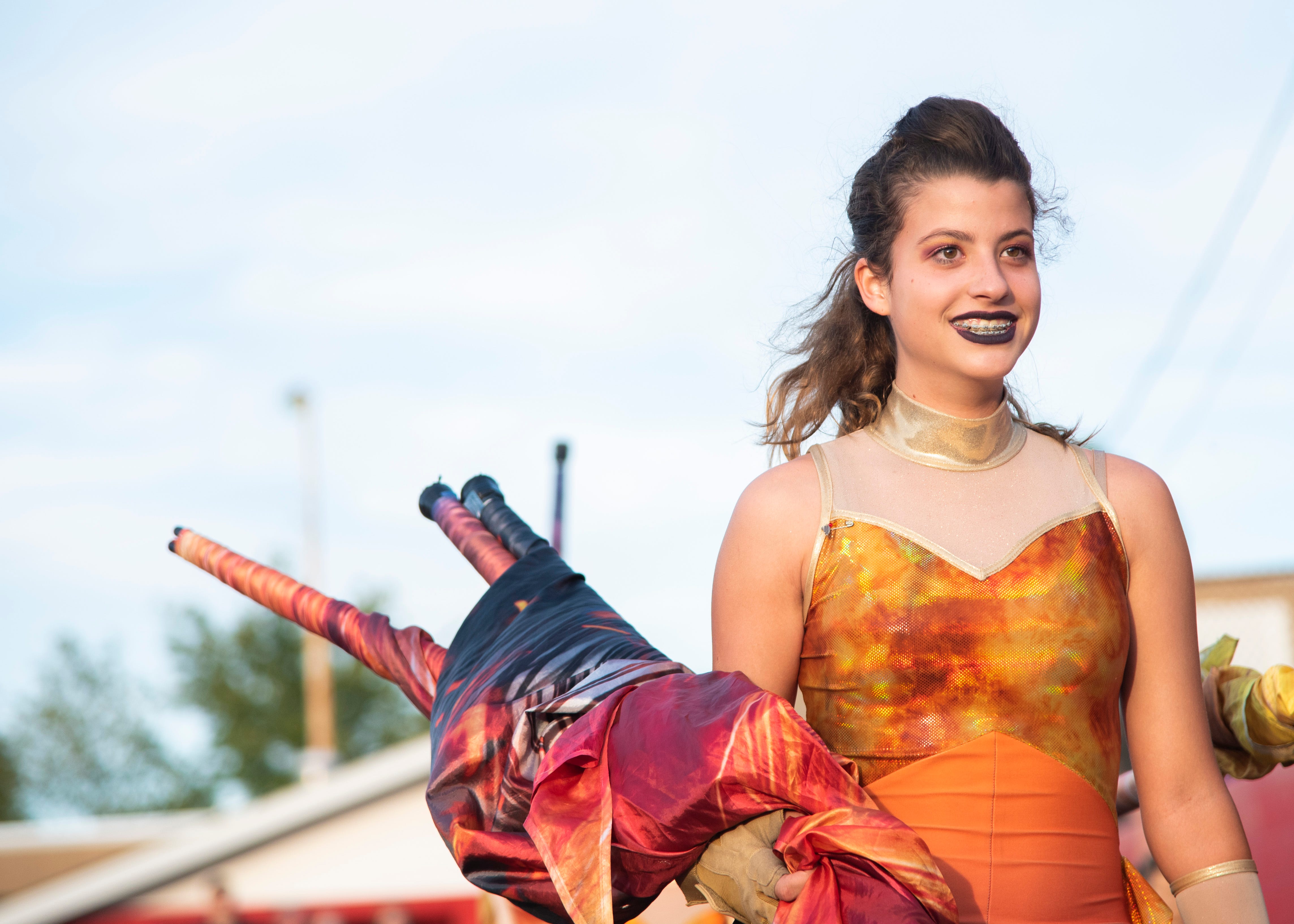 A Halls color guard member before the Halls and Central high school football game on Friday, October 4, 2019 at Halls High School.