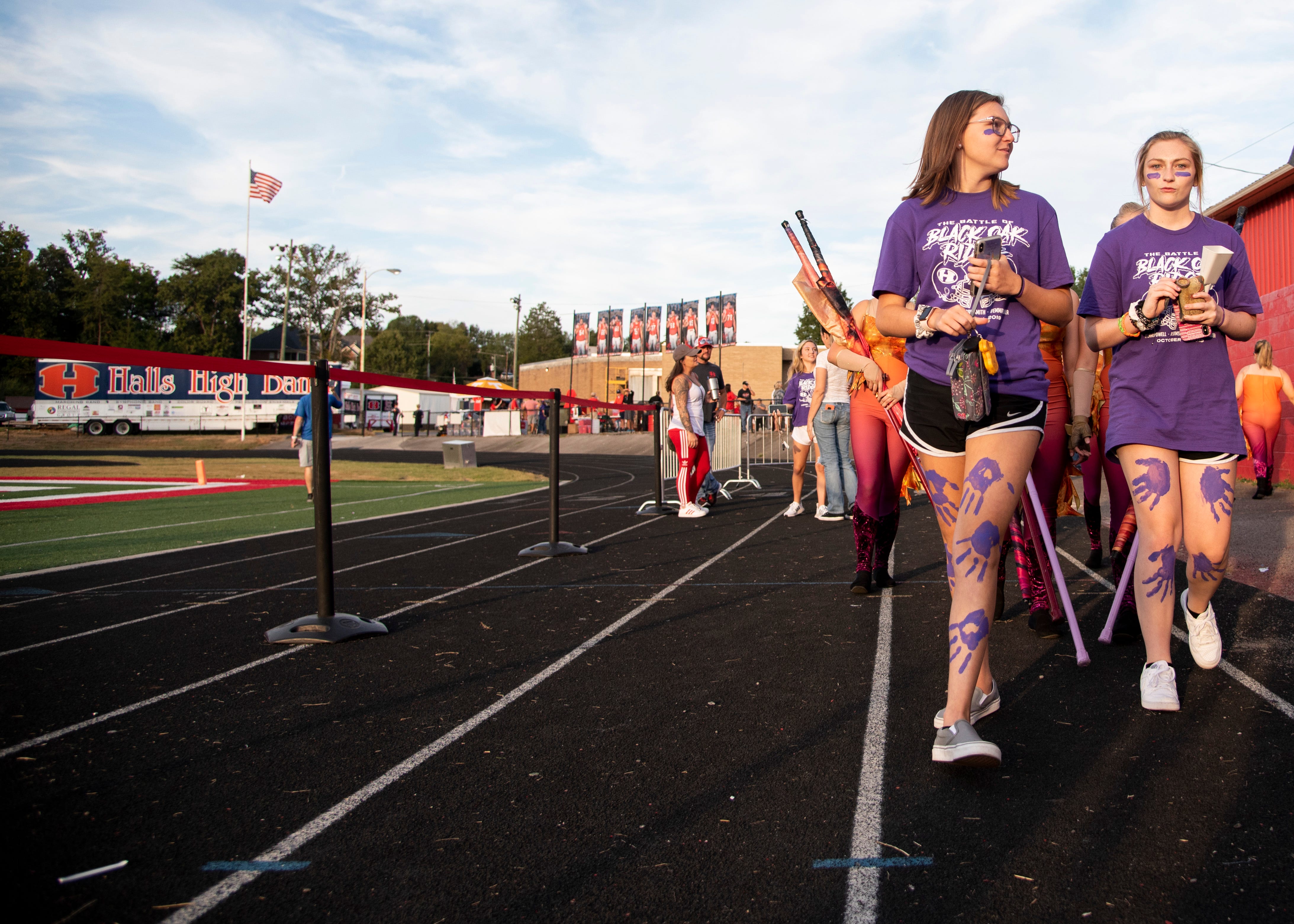 Halls students dressed for the "Purple Out" before the Halls and Central high school football game on Friday, October 4, 2019 at Halls High School.