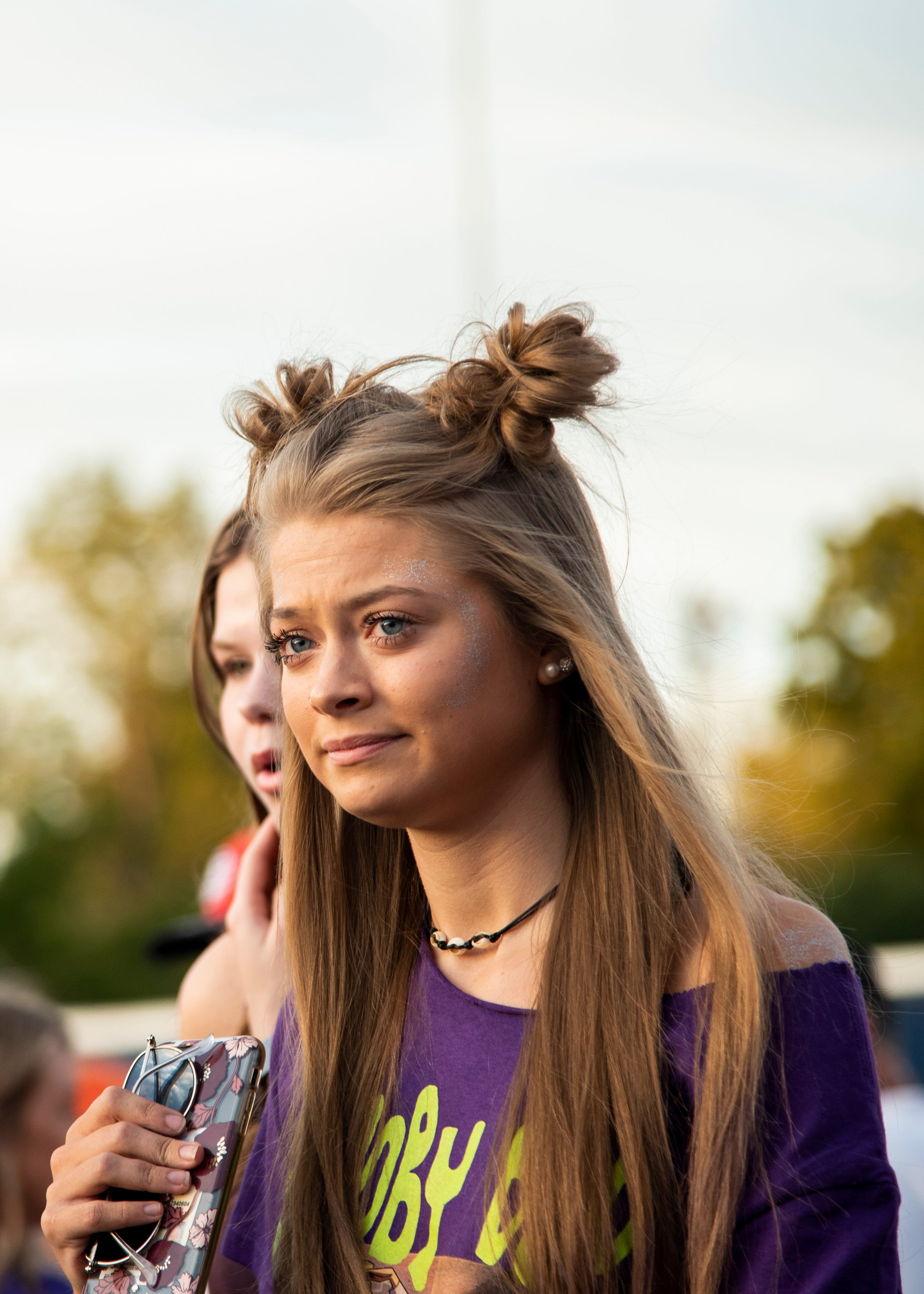 A Halls student walks to the stadium before the Halls and Central high school football game on Friday, October 4, 2019 at Halls High School.