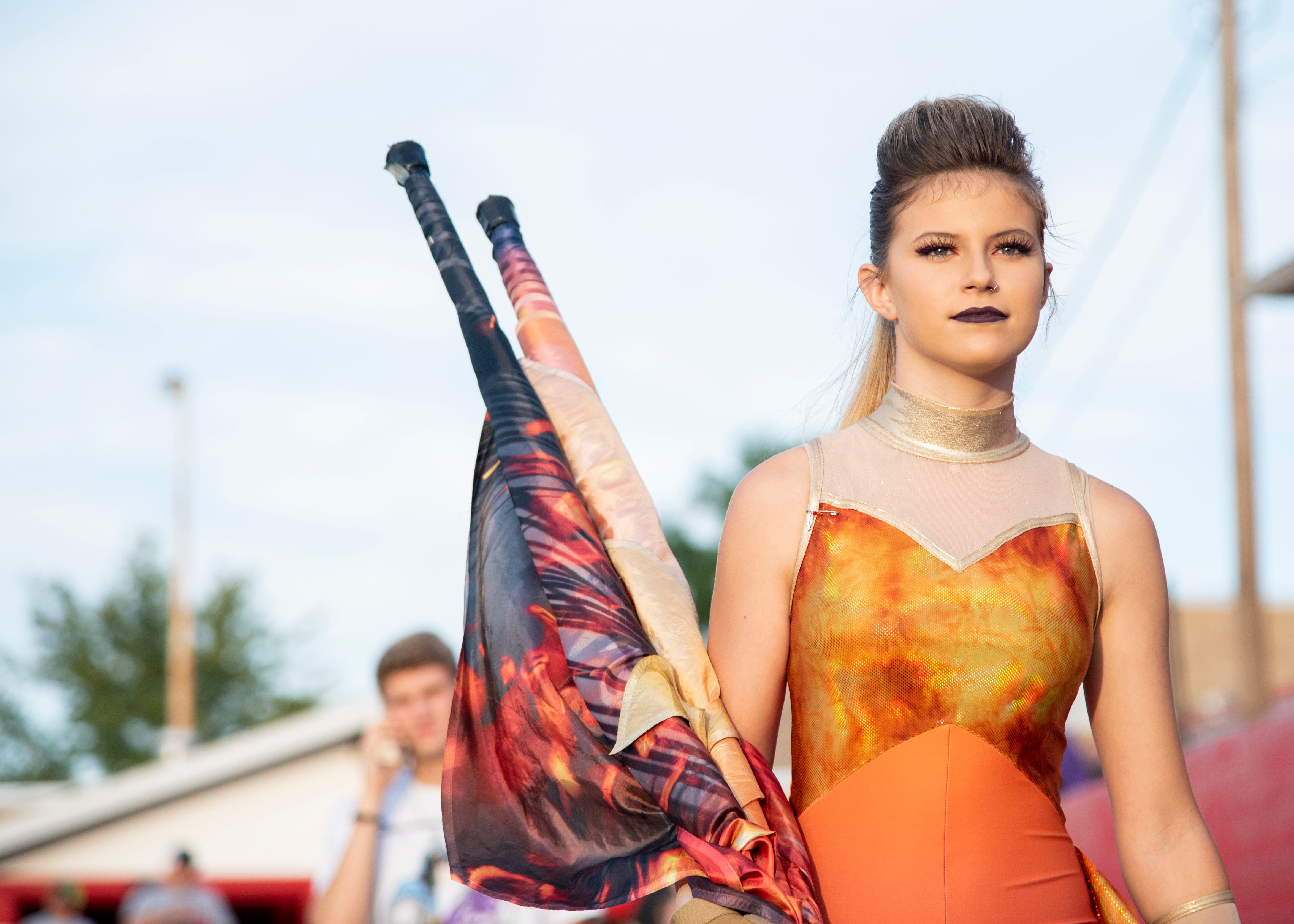 A Halls color guard member before the Halls and Central high school football game on Friday, October 4, 2019 at Halls High School.