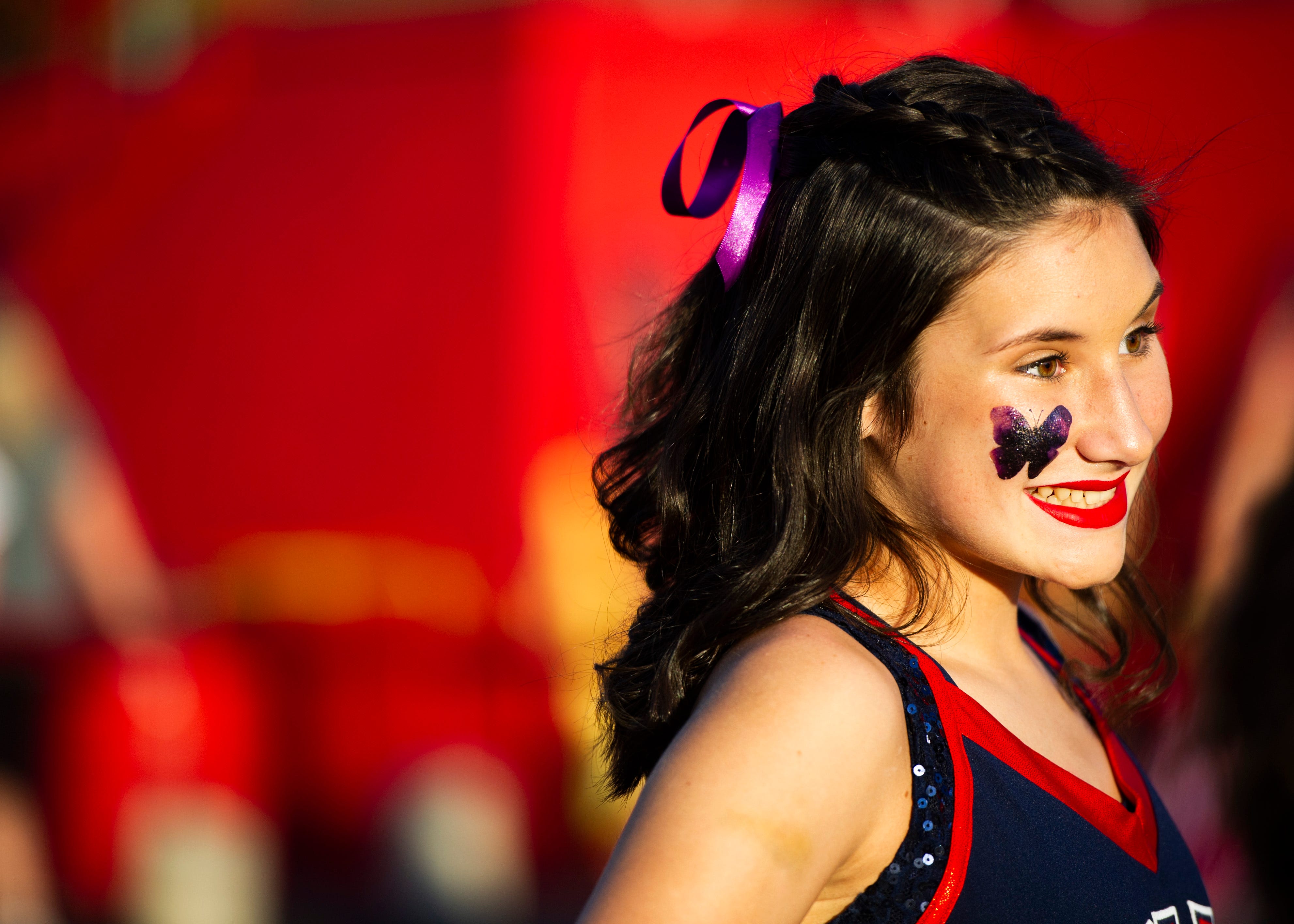 A Halls dance member pose for a picture before the Halls and Central high school football game on Friday, October 4, 2019 at Halls High School.