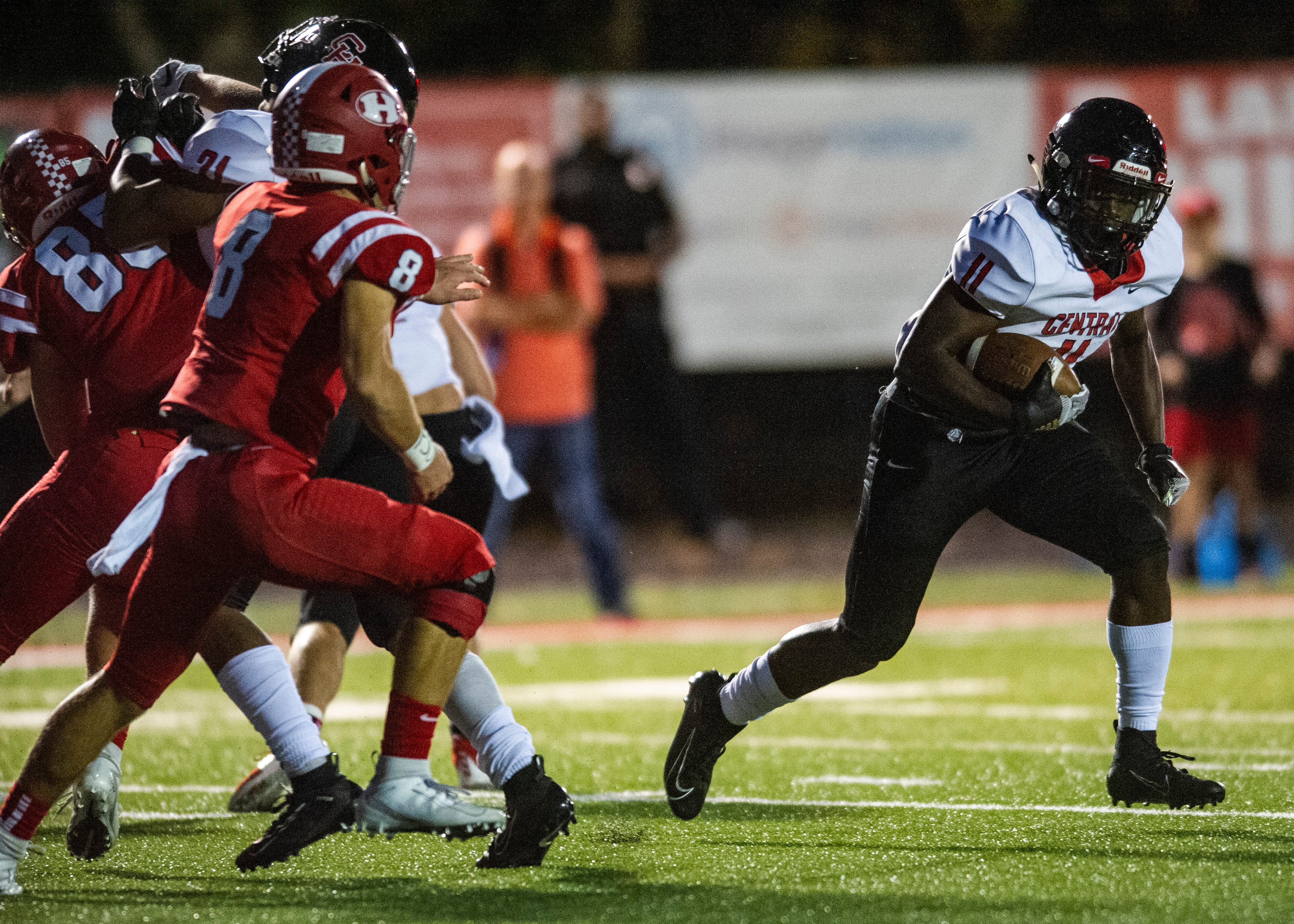 Central's Jason Merritts (11) looks for a gap in the play during the Halls and Central high school football game on Friday, October 4, 2019 at Halls High School.