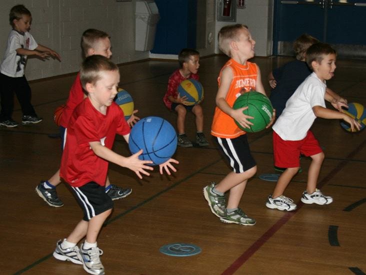 Kids at the York JCC doing basketball drills during one of the classes.