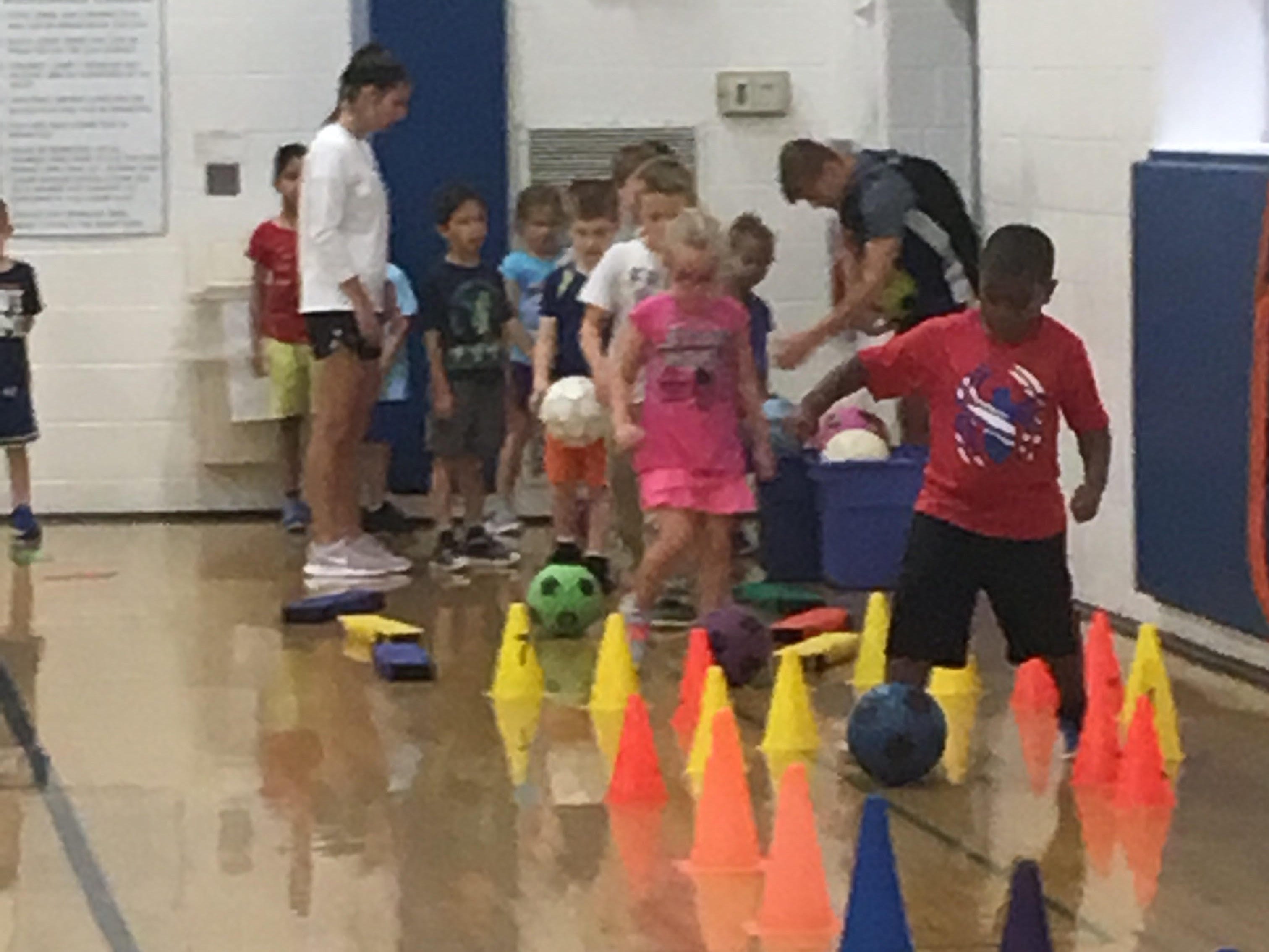 Kids going through soccer drills during a class at the York JCC